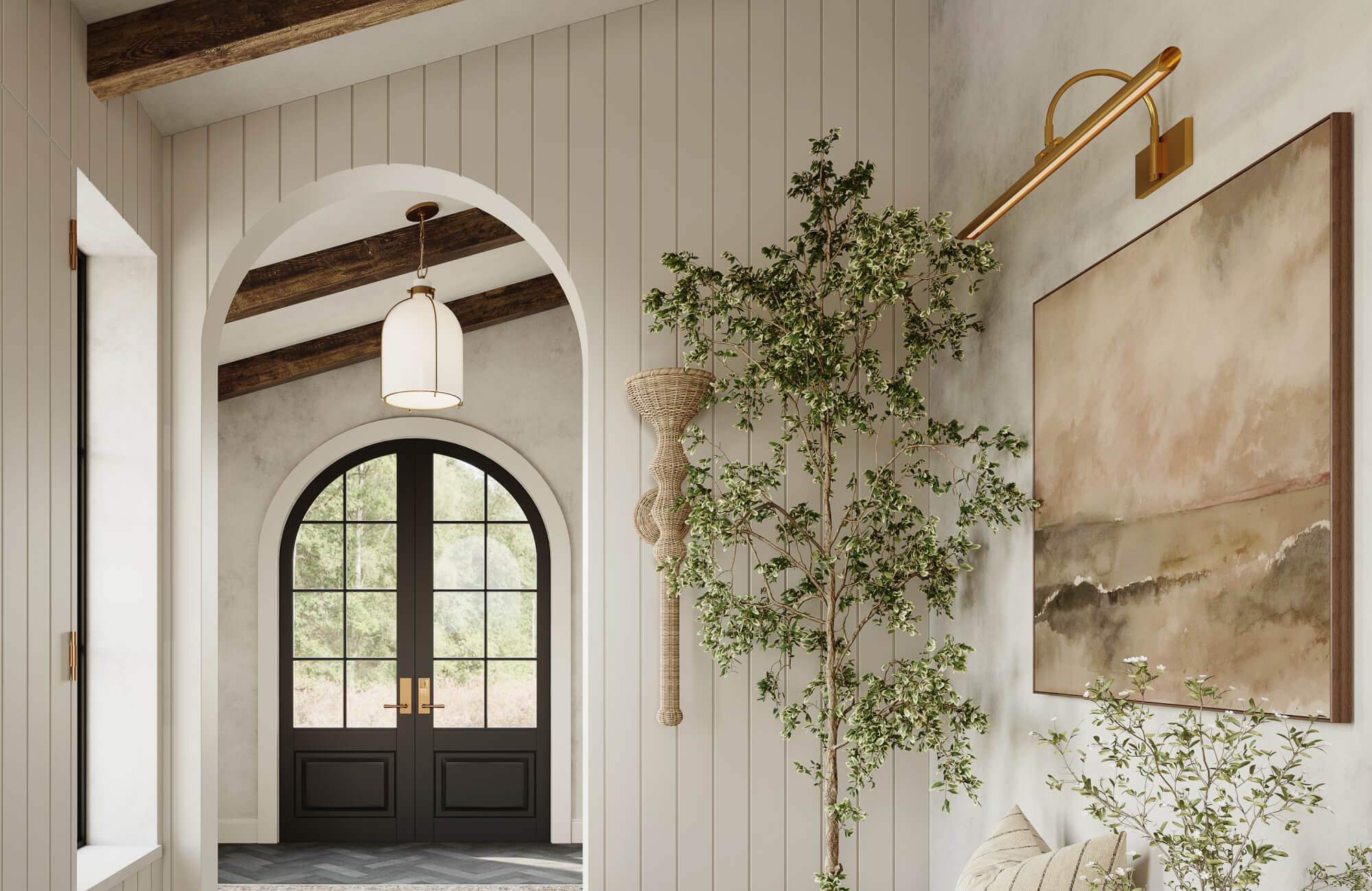 Elegant entryway with a soft pendant light for ambient glow and a brass picture light highlighting artwork, complemented by natural daylight streaming through arched glass doors.
