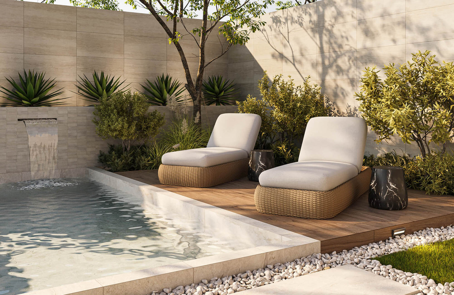 Outdoor lounge chairs with woven synthetic wicker base and cushioned tops beside a pool, highlighting durable, weather-resistant materials suited for long-term outdoor use.