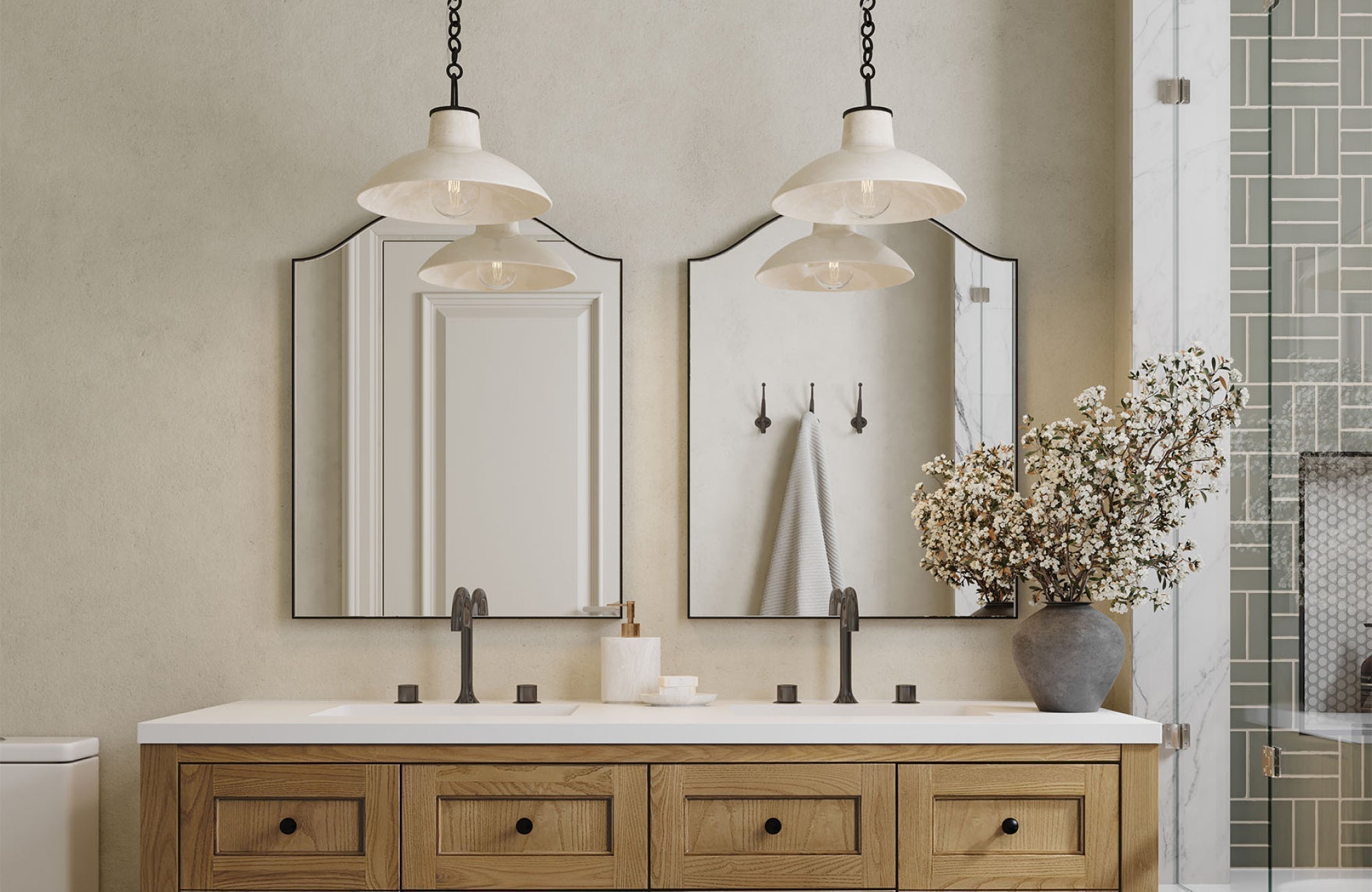 Double mirrors in a master bathroom sized to match a dual vanity, adding balance and symmetry above the sinks.