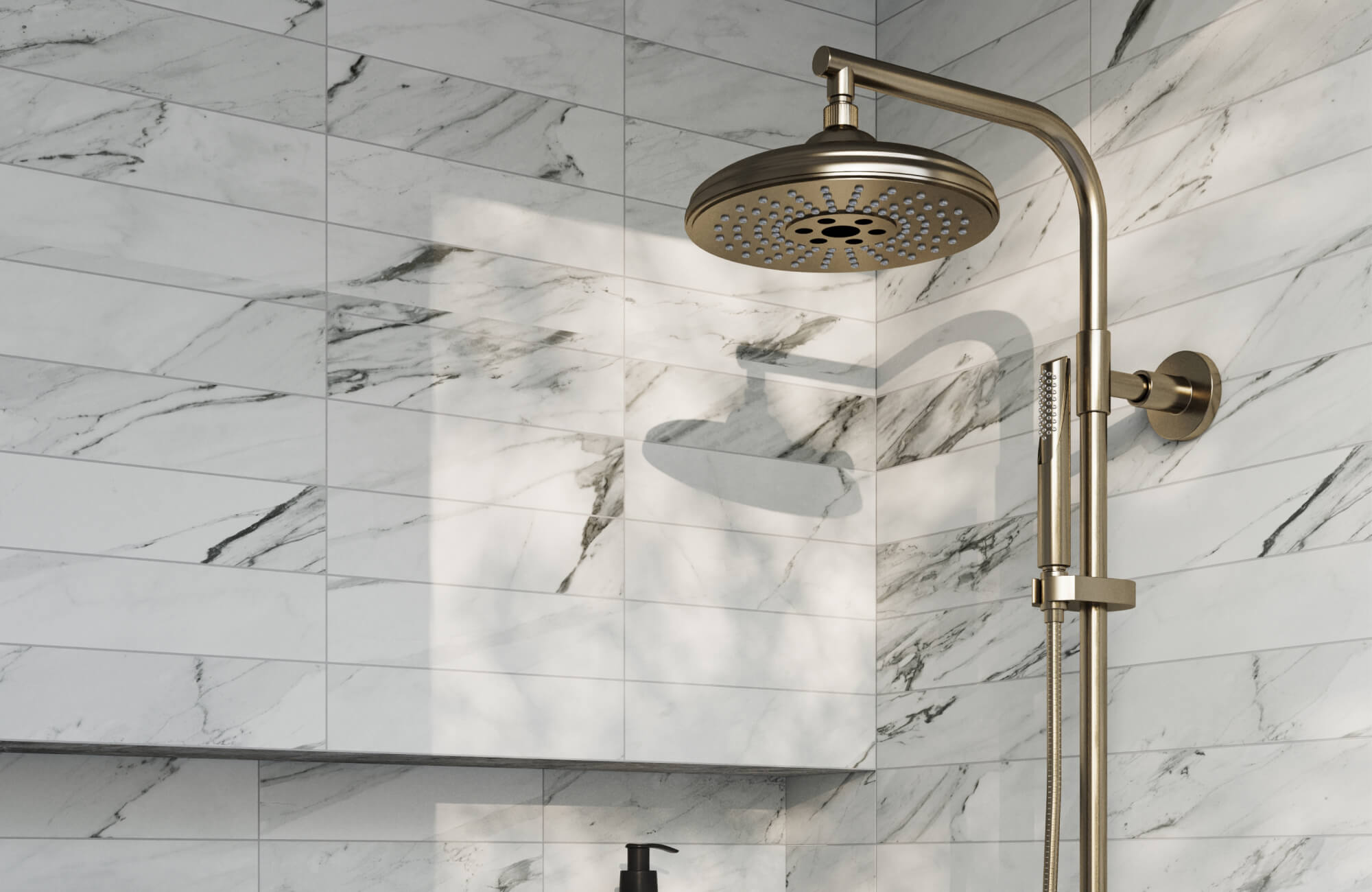 Sleek marble look porcelain subway tiles with striking gray veining elevate this modern shower space, complemented by a brushed brass shower fixture.