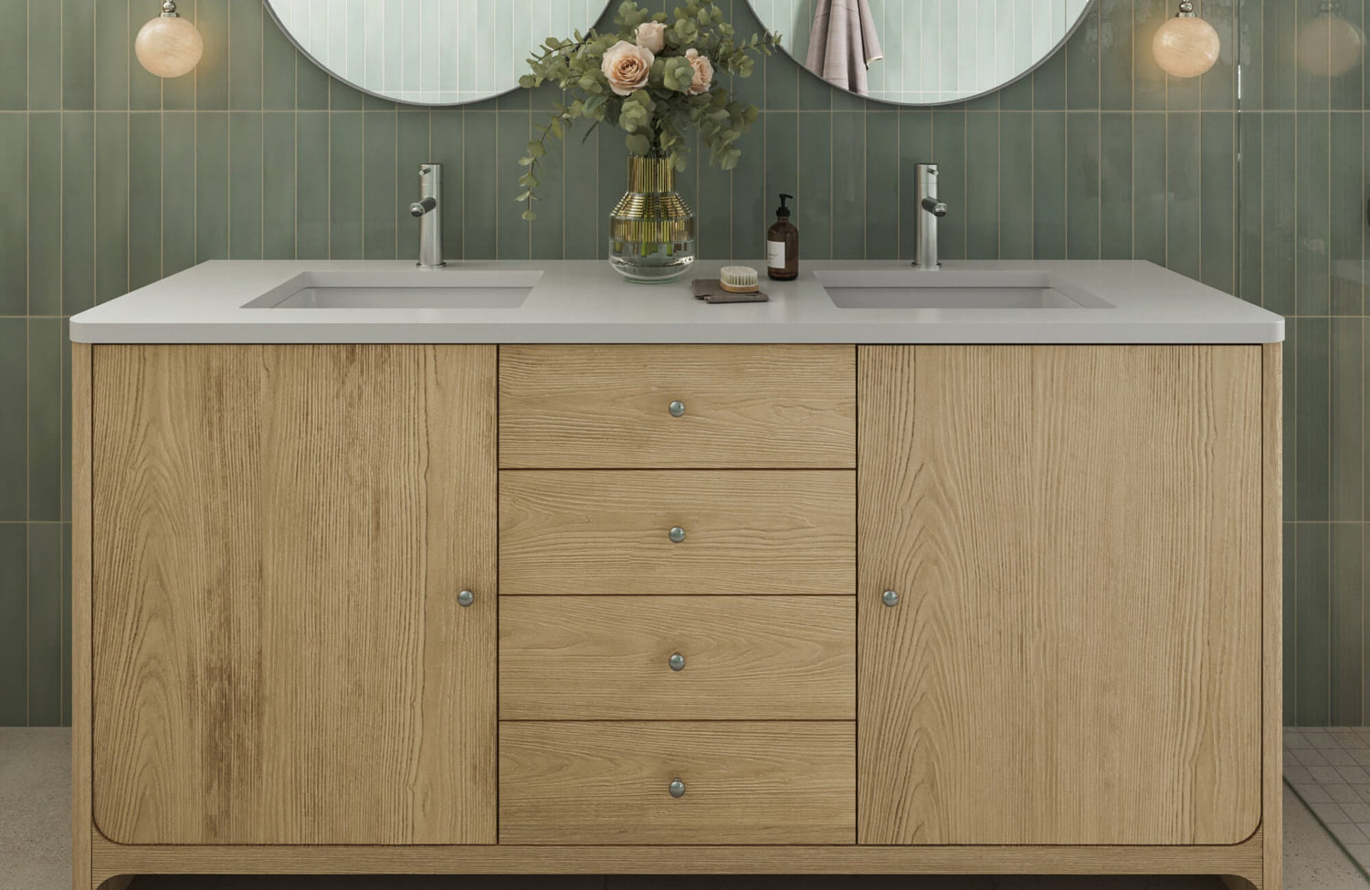Sage green vertical tile backsplash paired with a natural oak vanity and double sinks, creating a serene, spa-inspired bathroom.