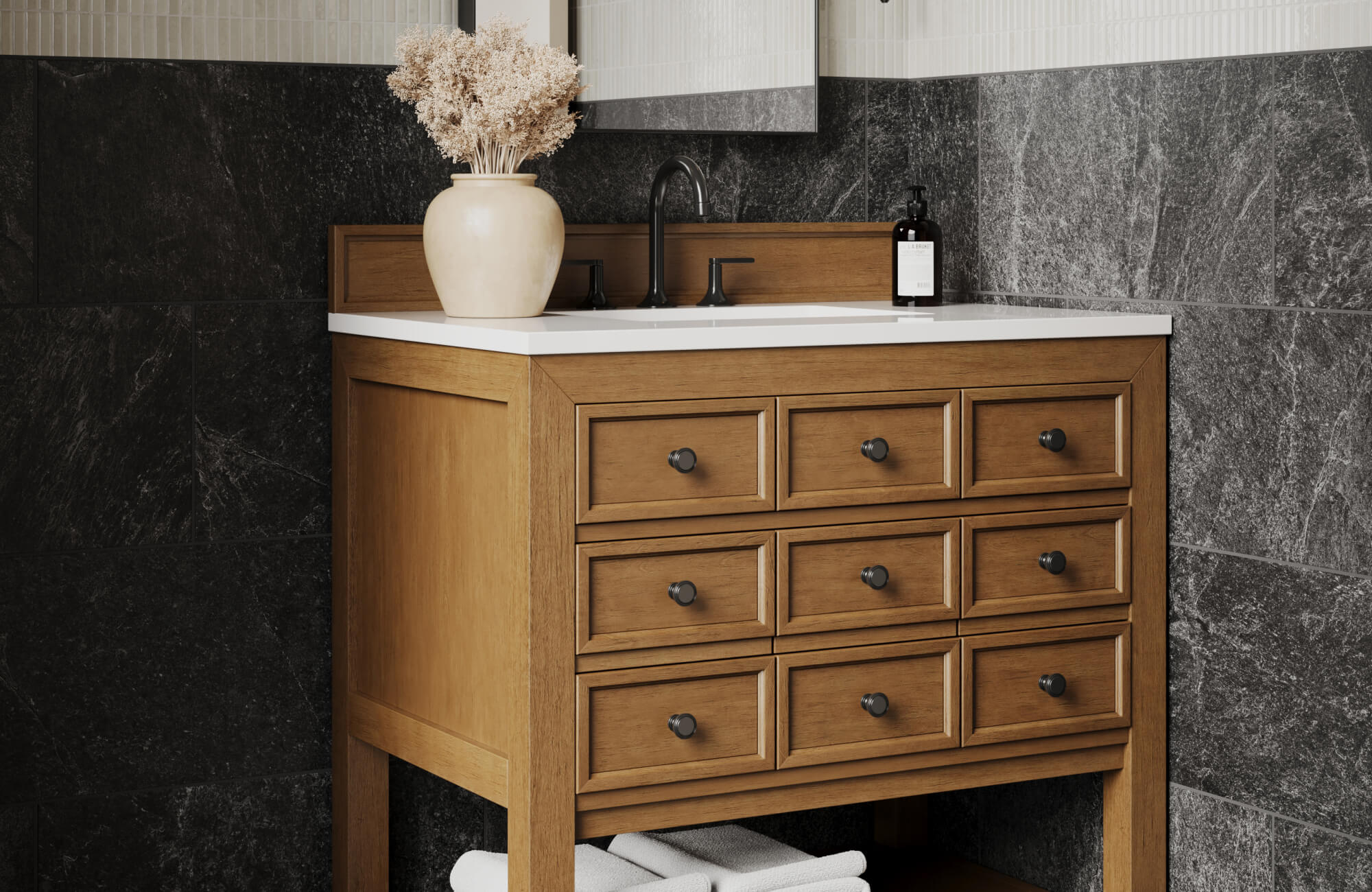 Light oak vanity with black hardware and quartz countertop, styled to enhance space in a small bathroom