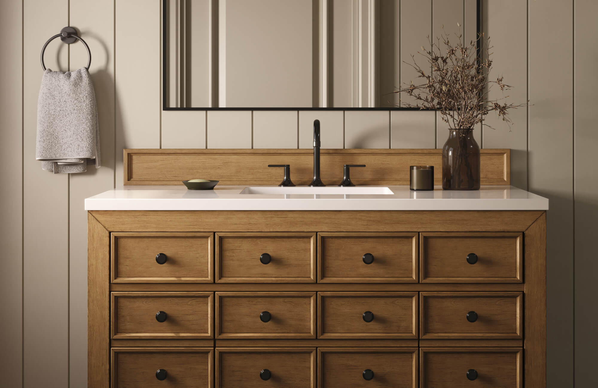Wide wood vanity with multiple drawers and a white countertop, paired with a rectangular mirror in a neutral powder room.