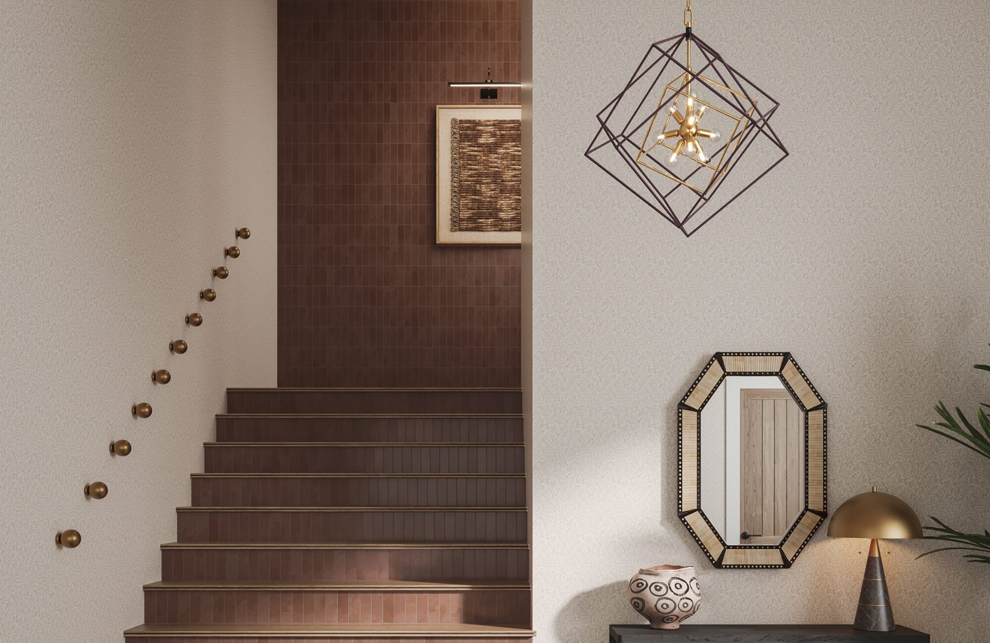 Staircase with warm brown tiles and textured walls, styled with geometric pendant lighting and classic framed wall art for a timeless, layered look.