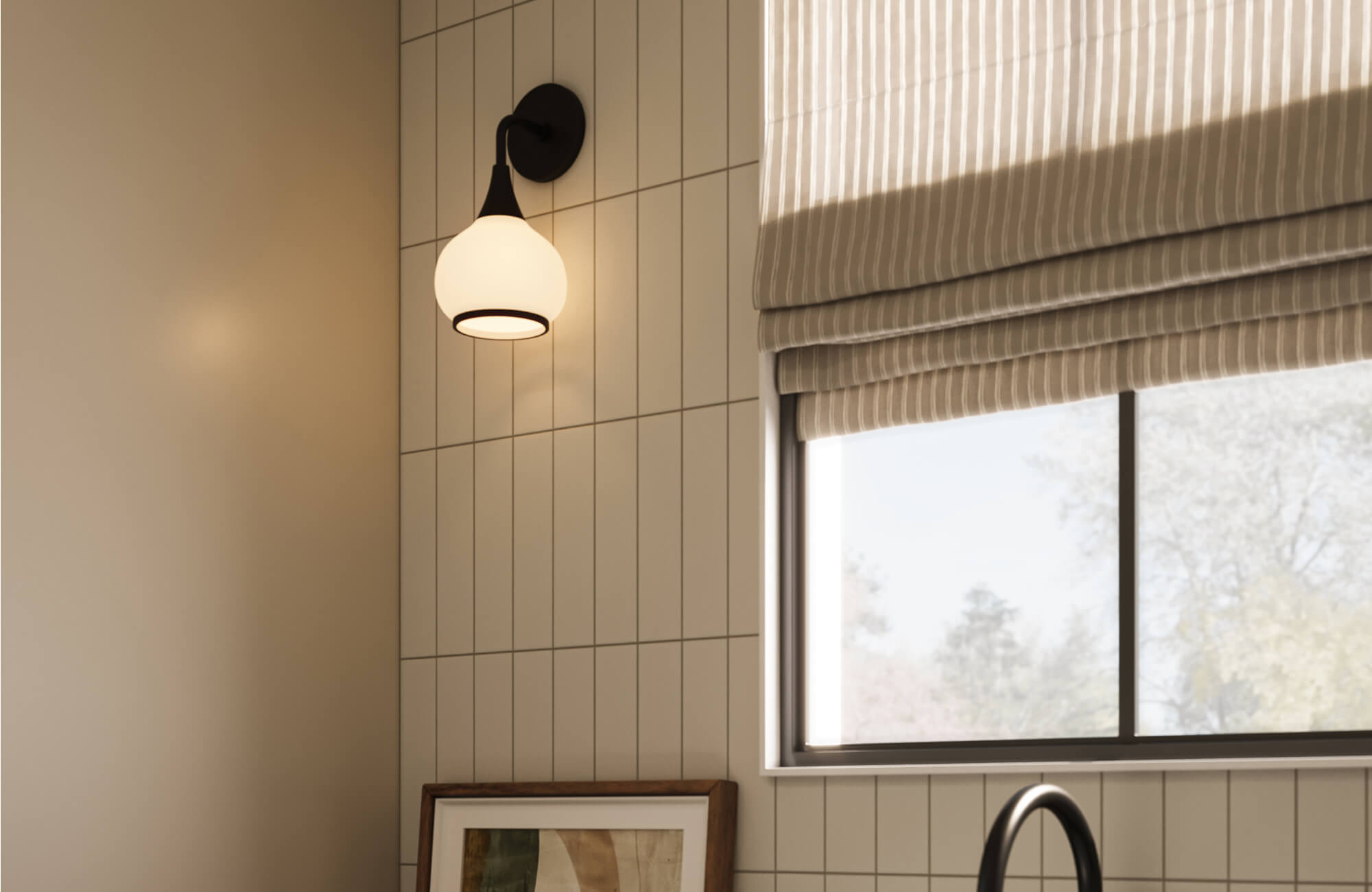 A minimalist wall light with a matte black mount and softly diffused glass shade is installed against vertically laid neutral tiles, casting a warm glow that complements the clean-lined window treatment.