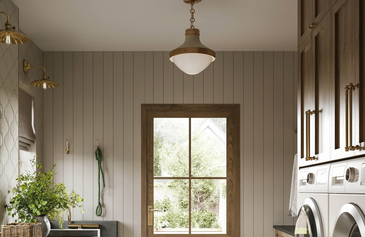 Warm laundry room with vertical shiplap walls, brass-accented cabinetry, a vintage-style pendant light, and quatrefoil tile detailing.