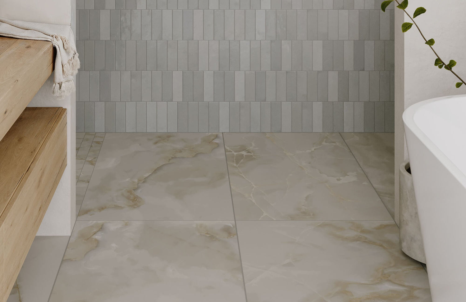 Close-up of marble look porcelain tiles and vertically textured wall tiles creating a spa-like bathroom atmosphere.