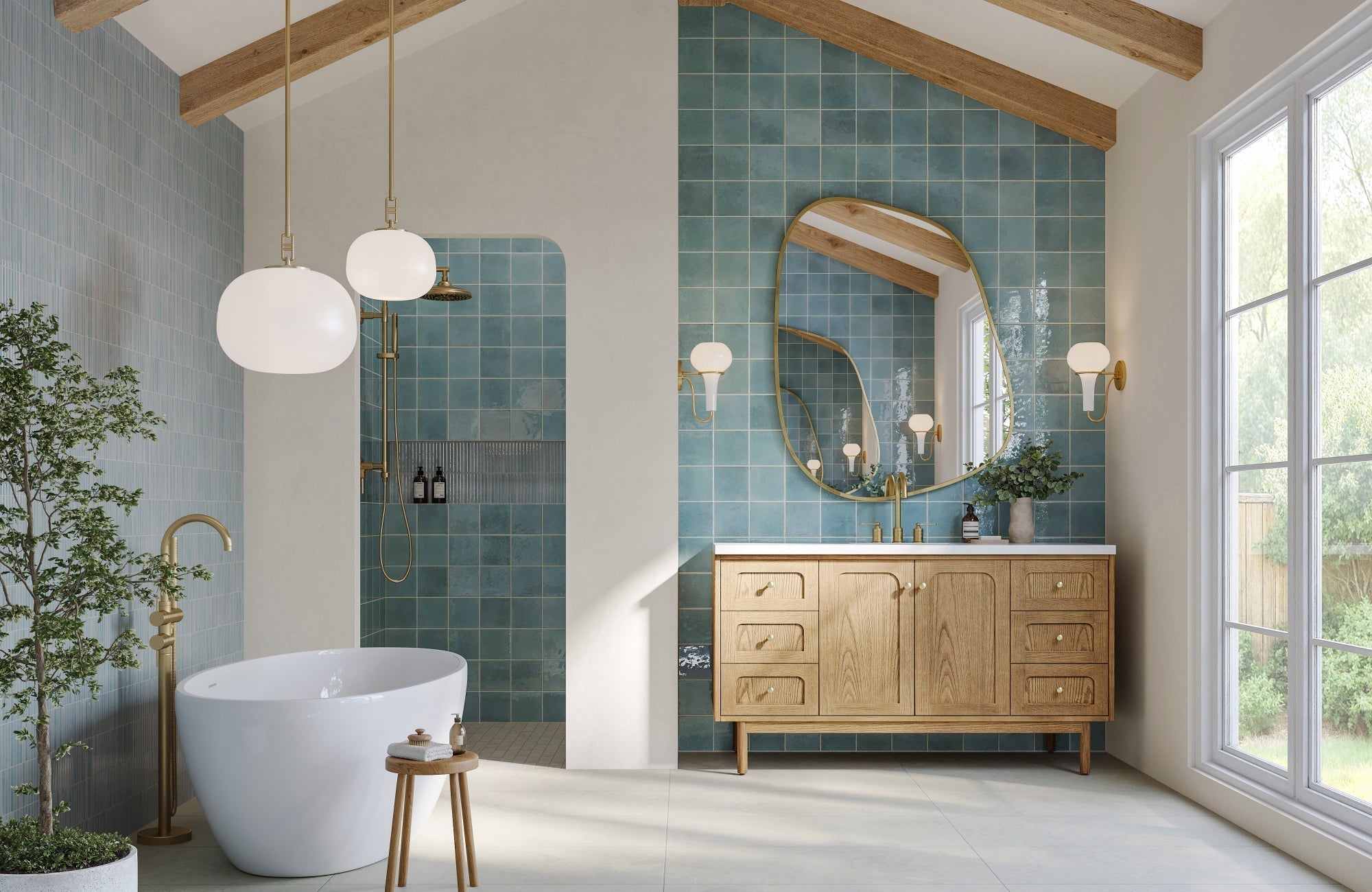 Bathroom with glossy aqua ceramic wall tiles, wood vanity, and freestanding tub under exposed beams and modern brass fixtures.