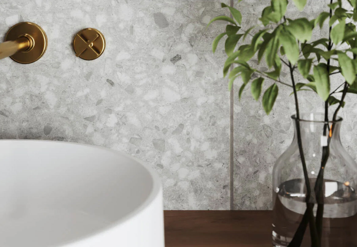 Chic terrazzo-look wall tile with a speckled pattern, adding a modern twist to classic style
