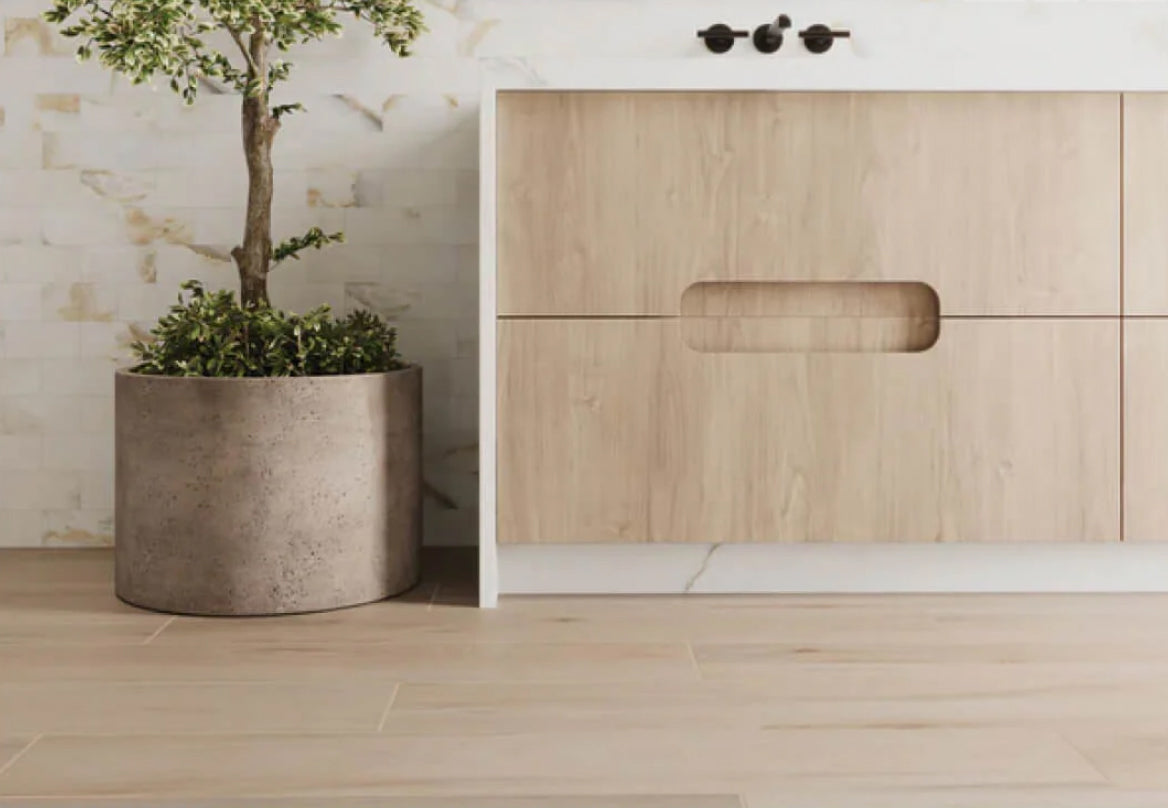 Warm wood look bathroom tiles complementing a minimalist vanity design
