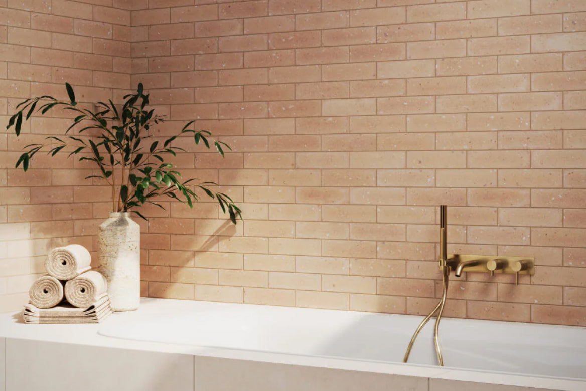 Orange Bathroom Tiles add a warm, lively touch to a modern bathroom interior.