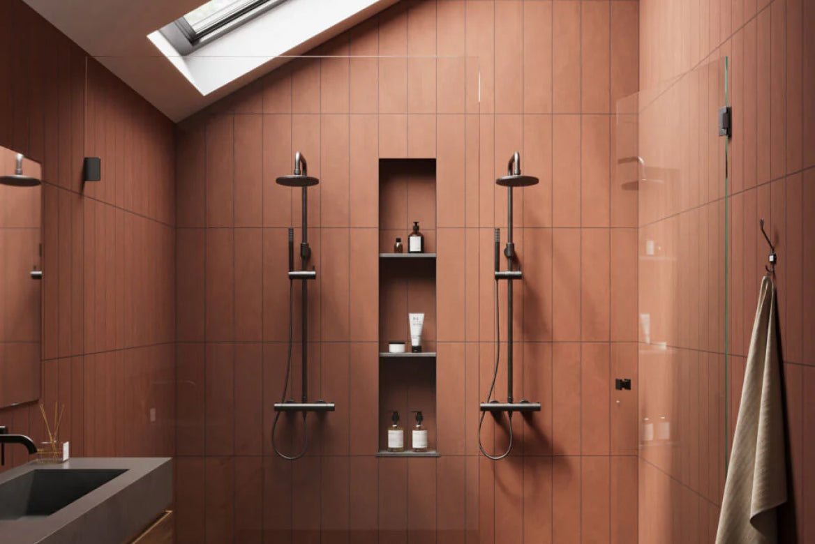 Red Bathroom Tiles infuse a vibrant, energizing ambiance into a sleek bathroom decor.