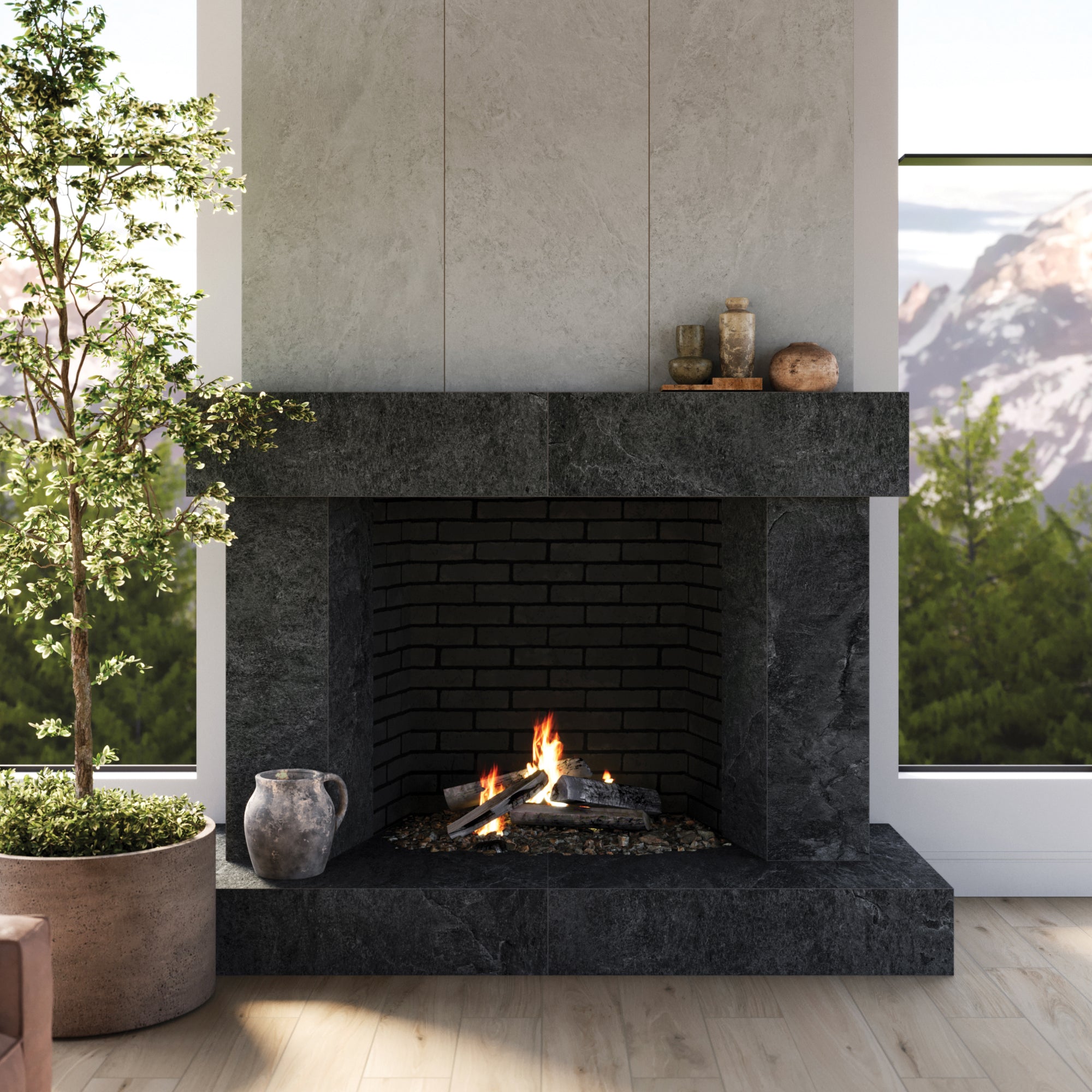 A lavish fireplace adorned with Quartzite Look Dawson 24x48 Matte Porcelain Tiles in Charcoal, creating a dramatic and elegant contrast against the pristine Dawson 24x48 Matte Porcelain Tiles in Alabaster. The harmonious pairing exudes a sophisticated atmosphere, blending the raw, natural essence of quartzite with the refined quality of porcelain, making it a focal point of luxury and style.