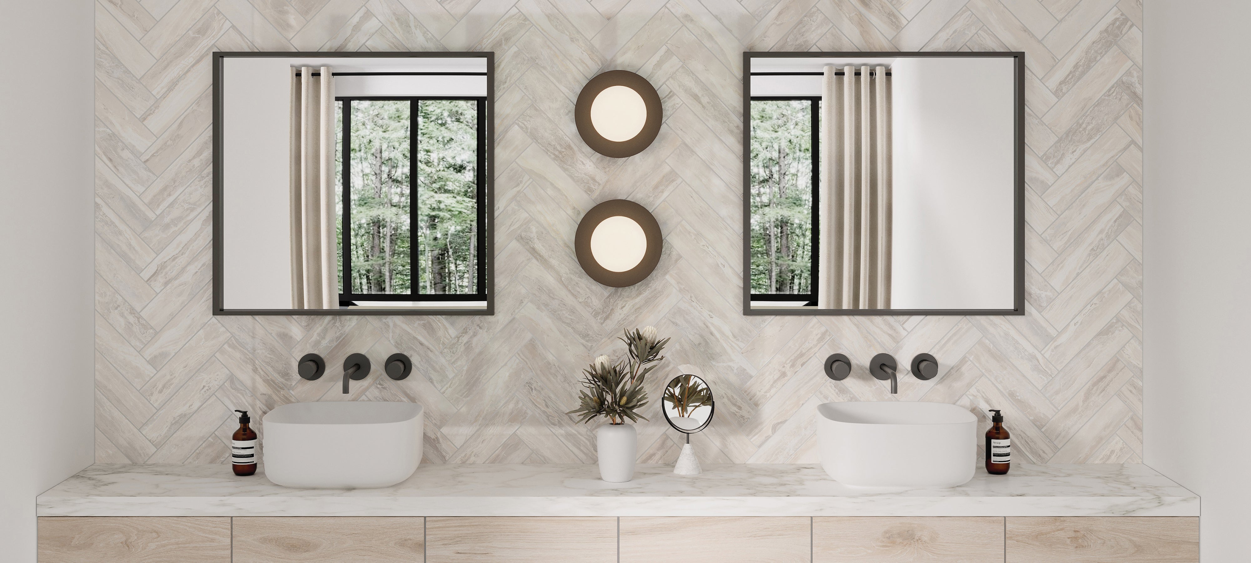 A sophisticated bathroom showcases walls adorned with Harley Greige 3x12 polished porcelain tiles, expertly arranged in a herringbone pattern. The stone-look tiles exude a natural elegance, their earthy tones and polished finish offering a balance of modern refinement and timeless style. Every tile reflects meticulous craftsmanship, contributing to a space that's both visually striking and invitingly serene.