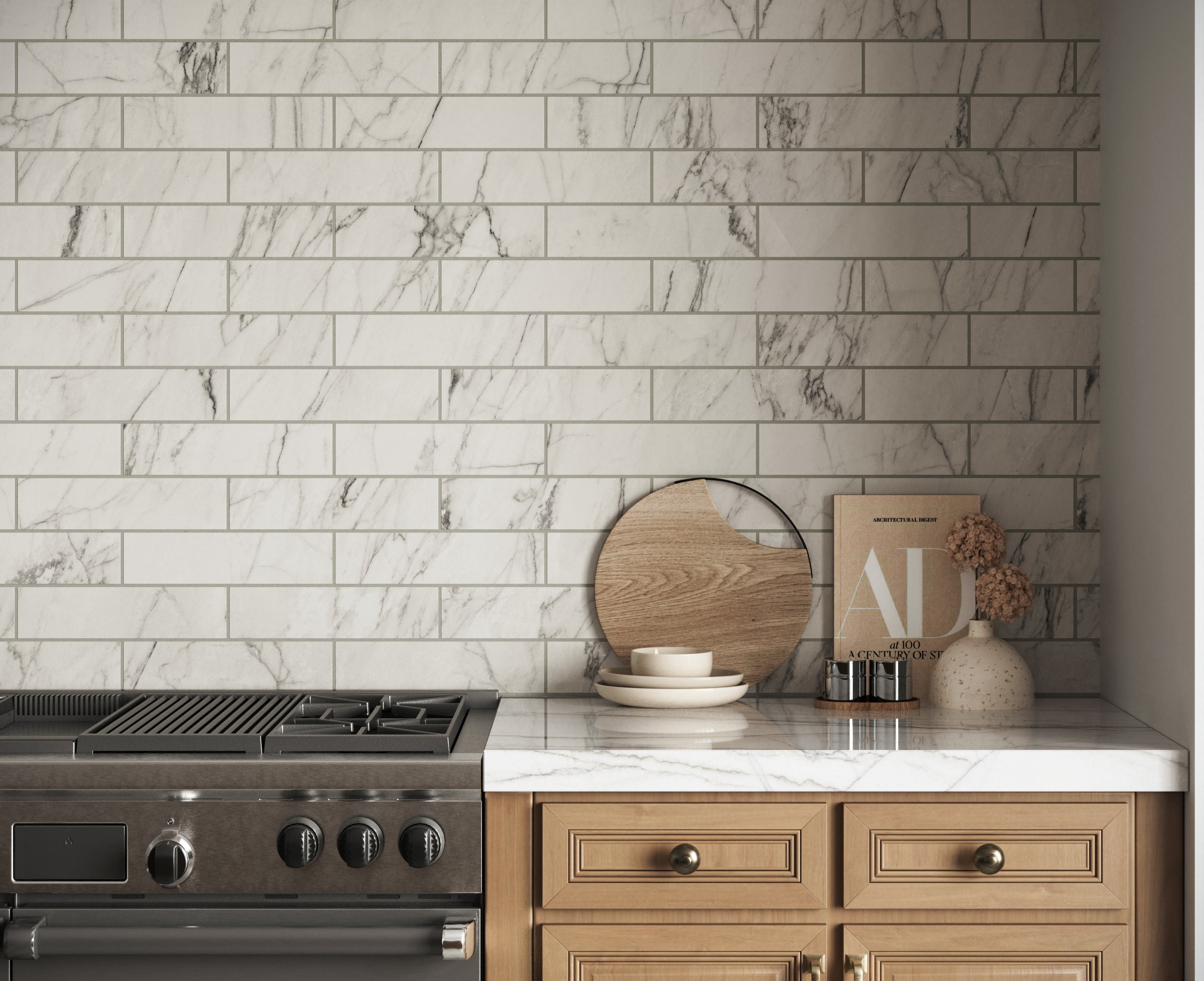 Elegant white marble look subway tiles with light grey veining create a bright, sophisticated kitchen backsplash, complementing warm wooden cabinets and sleek appliances.