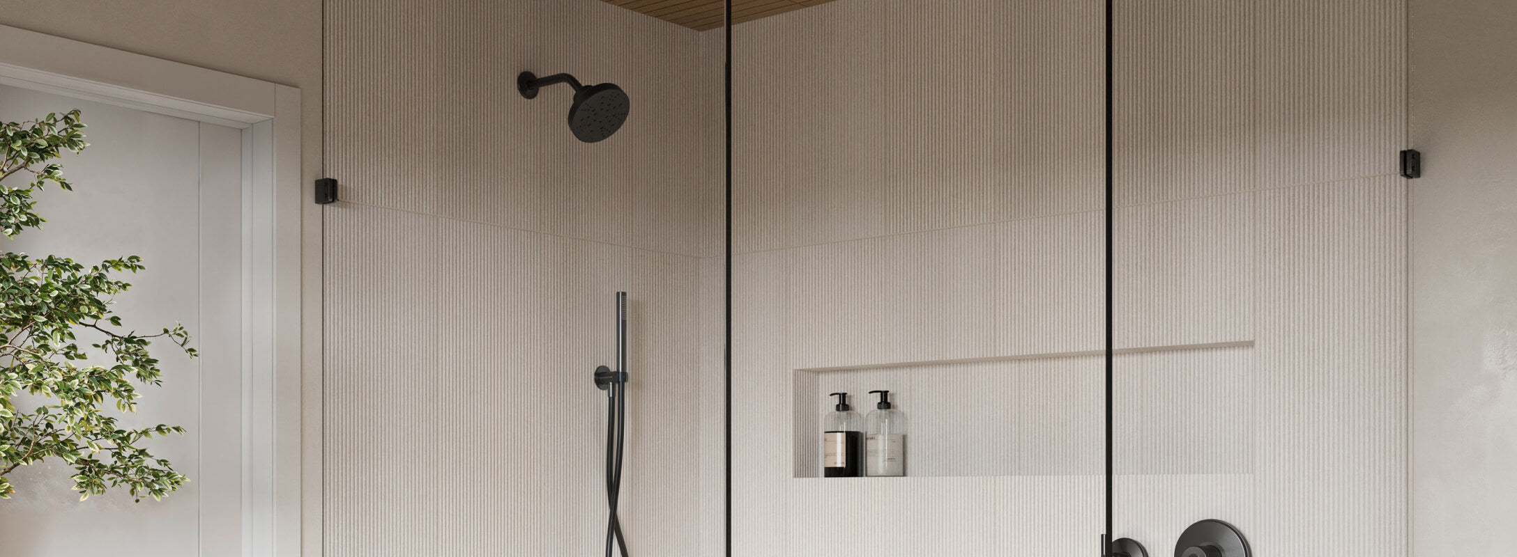 Minimalist shower with beige vertical tiles, black fixtures, and a built-in shelf, complemented by a plant for a serene and modern ambiance