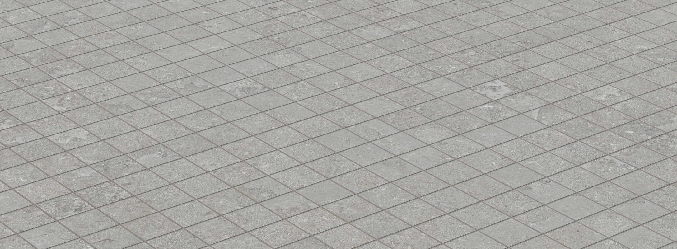 Grey cube mosaic tiles with a subtle stone pattern, offering a sophisticated and contemporary look for shower floors