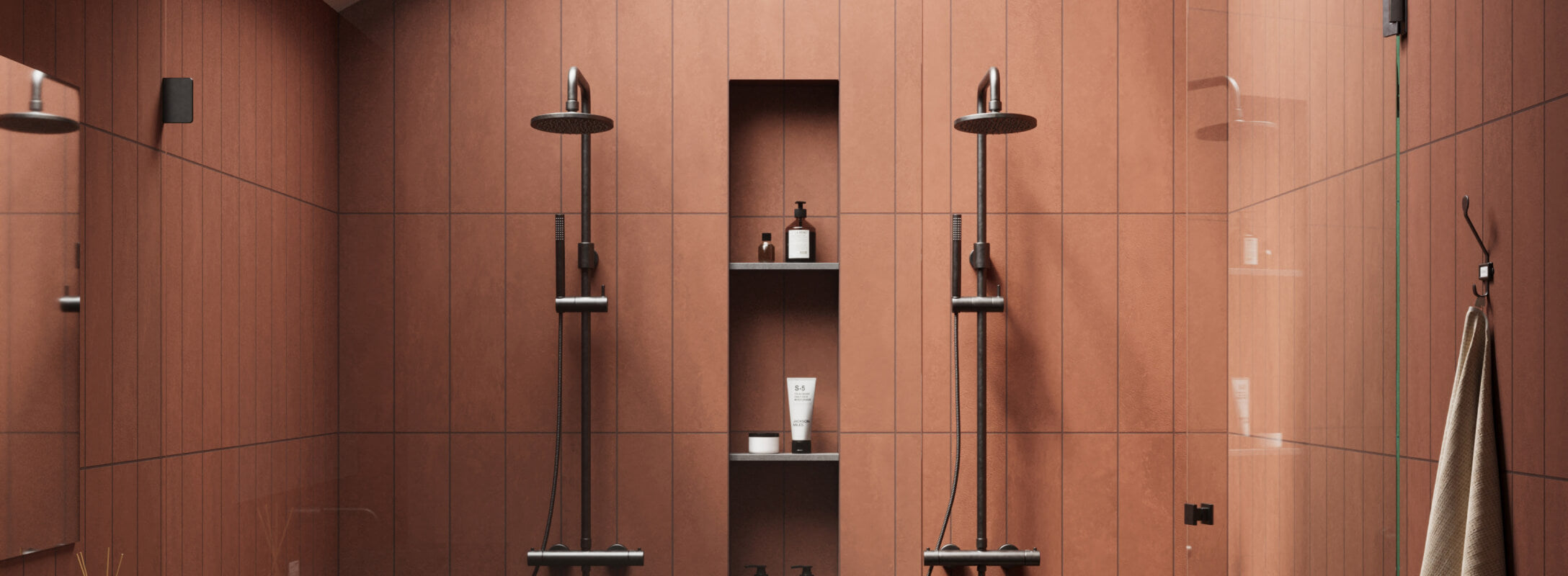 Contemporary shower with sleek red tiles, featuring dual rainfall showerheads and built-in shelving, creating a bold and modern ambiance