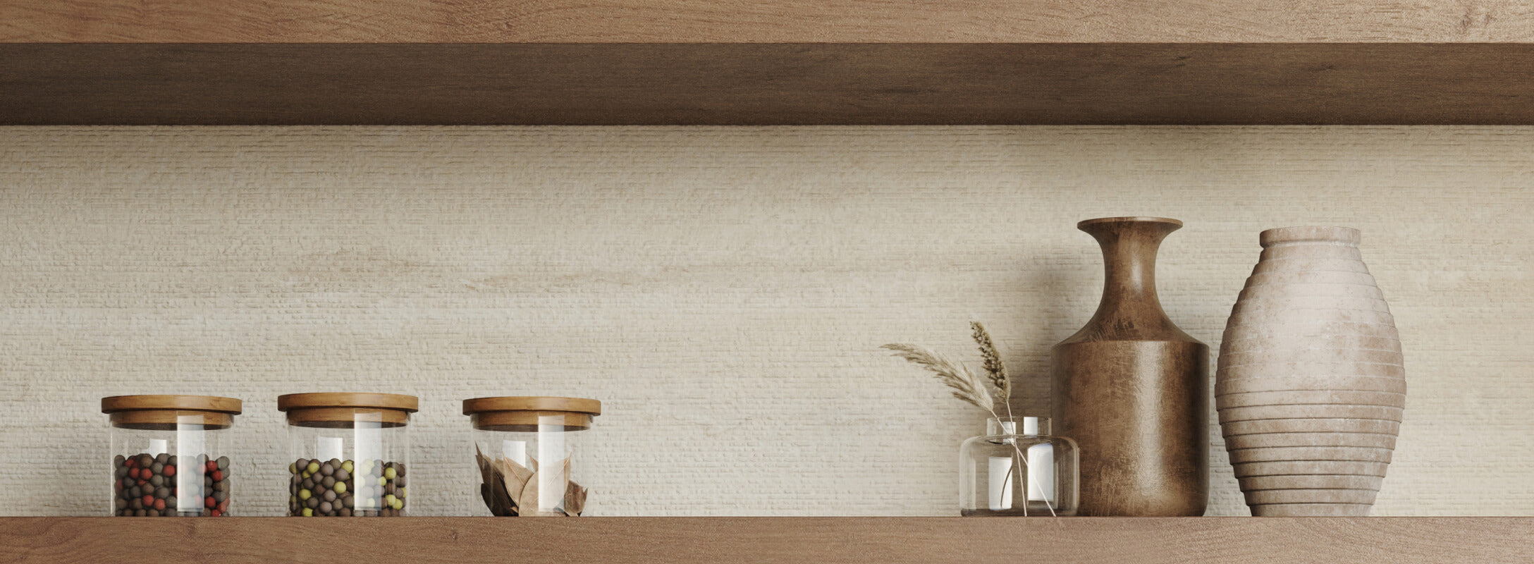 Minimalistic kitchen shelf with beige textured tiles as a backdrop, adorned with ceramic vases and jars filled with colorful spices