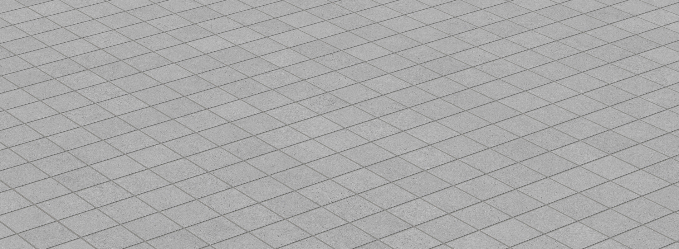 Grey cube mosaic tiles arranged in a diagonal pattern, creating a sleek and modern flooring design