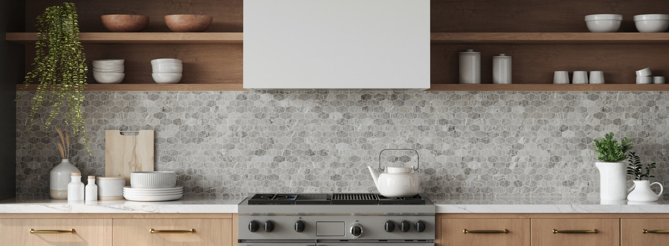 Hexagon-patterned grey mosaic tiles creating a stunning backsplash in a modern kitchen with wooden open shelves and white cabinetry