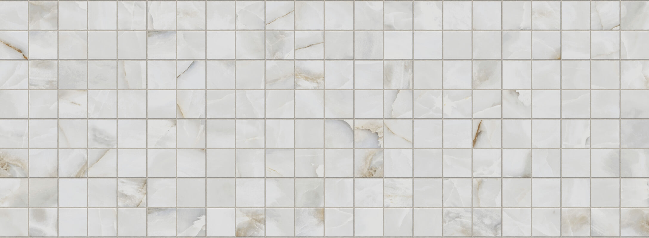 Elegant light grey mosaic tiles with subtle veining, ideal for adding a sophisticated touch to kitchen walls