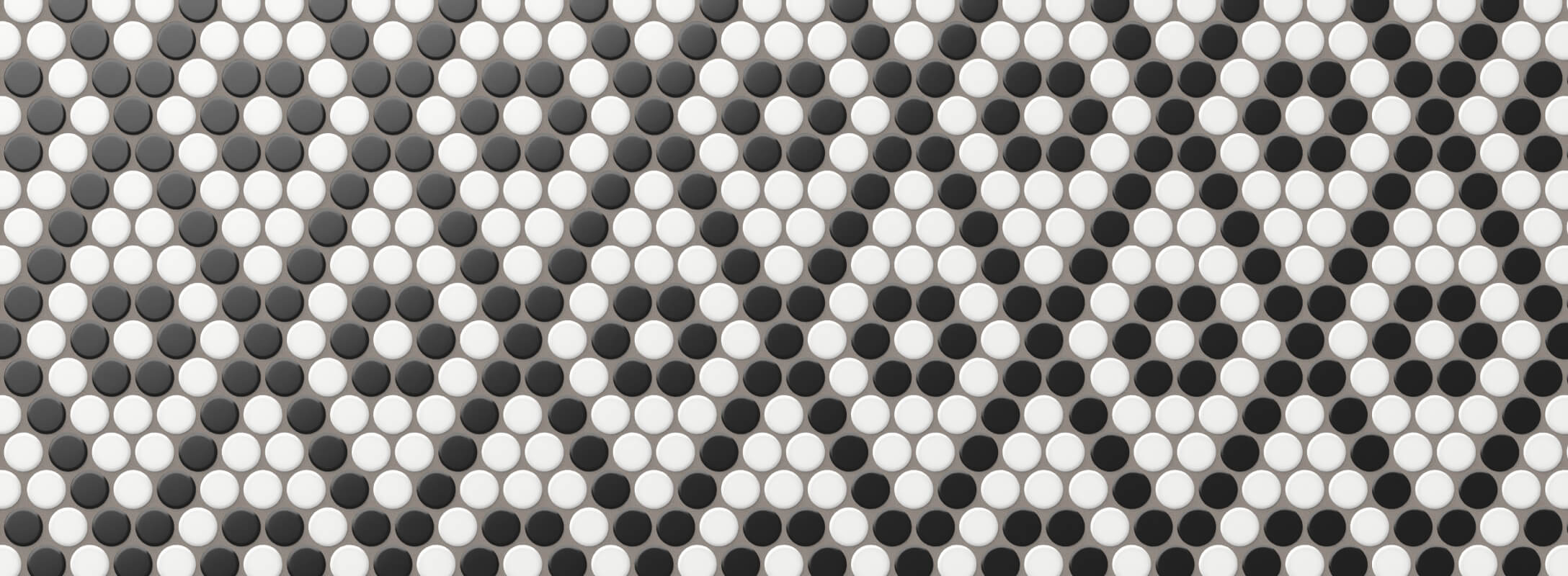 Charming multicolor mosaic tiles in black and white arranged in a playful pattern, perfect for adding a retro touch to kitchen walls