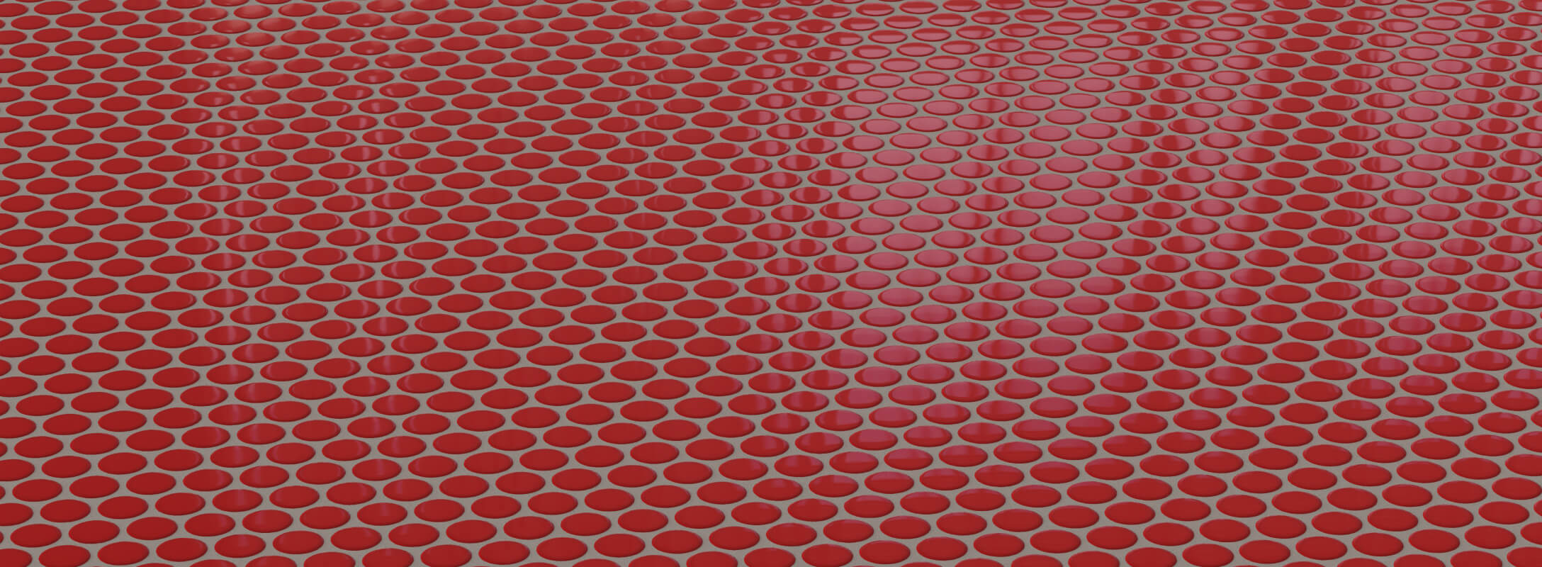 Vibrant red penny round mosaic tiles with a glossy finish, perfect for adding a bold statement to any kitchen floor