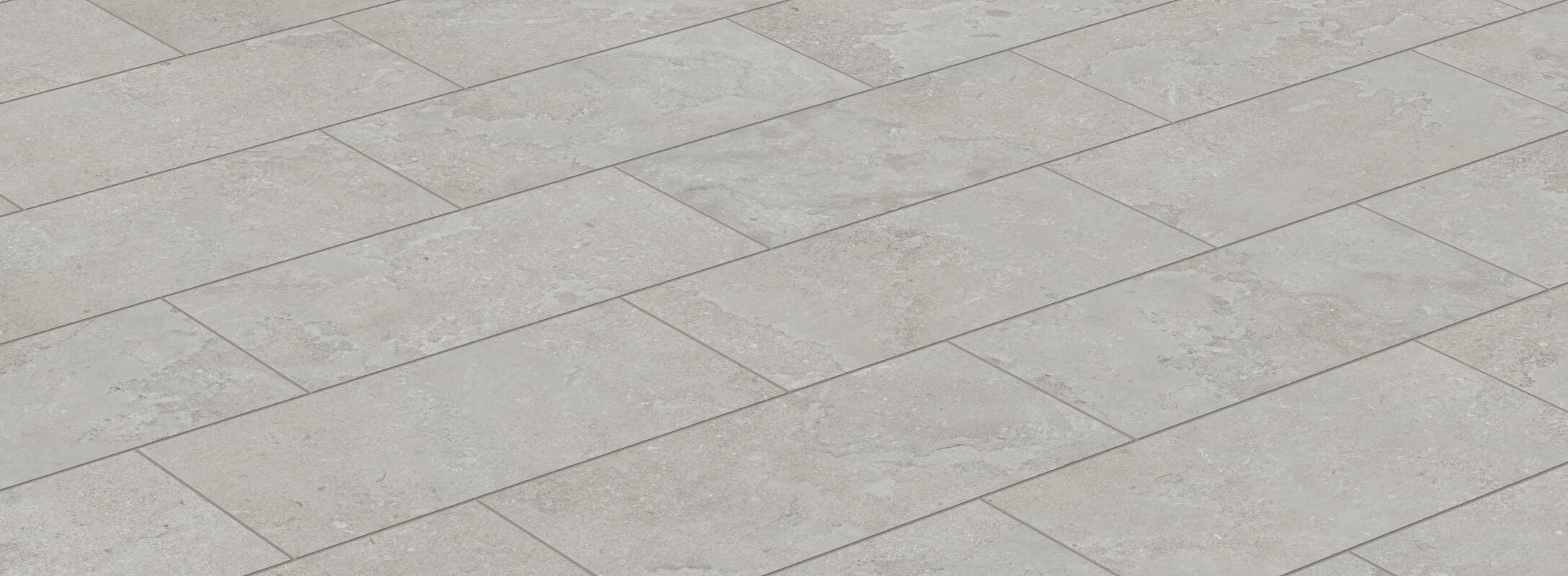 Light taupe floor tiles with a subtle textured pattern, providing a sophisticated and neutral base for any kitchen design