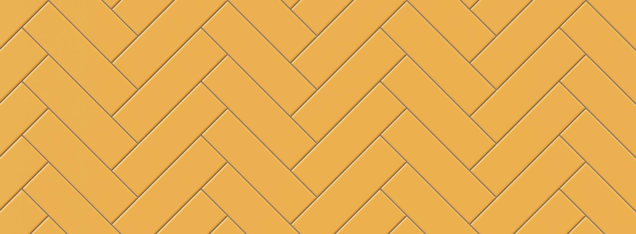 Bright yellow tiles arranged in a herringbone pattern, bringing a vibrant and dynamic energy to any kitchen wall