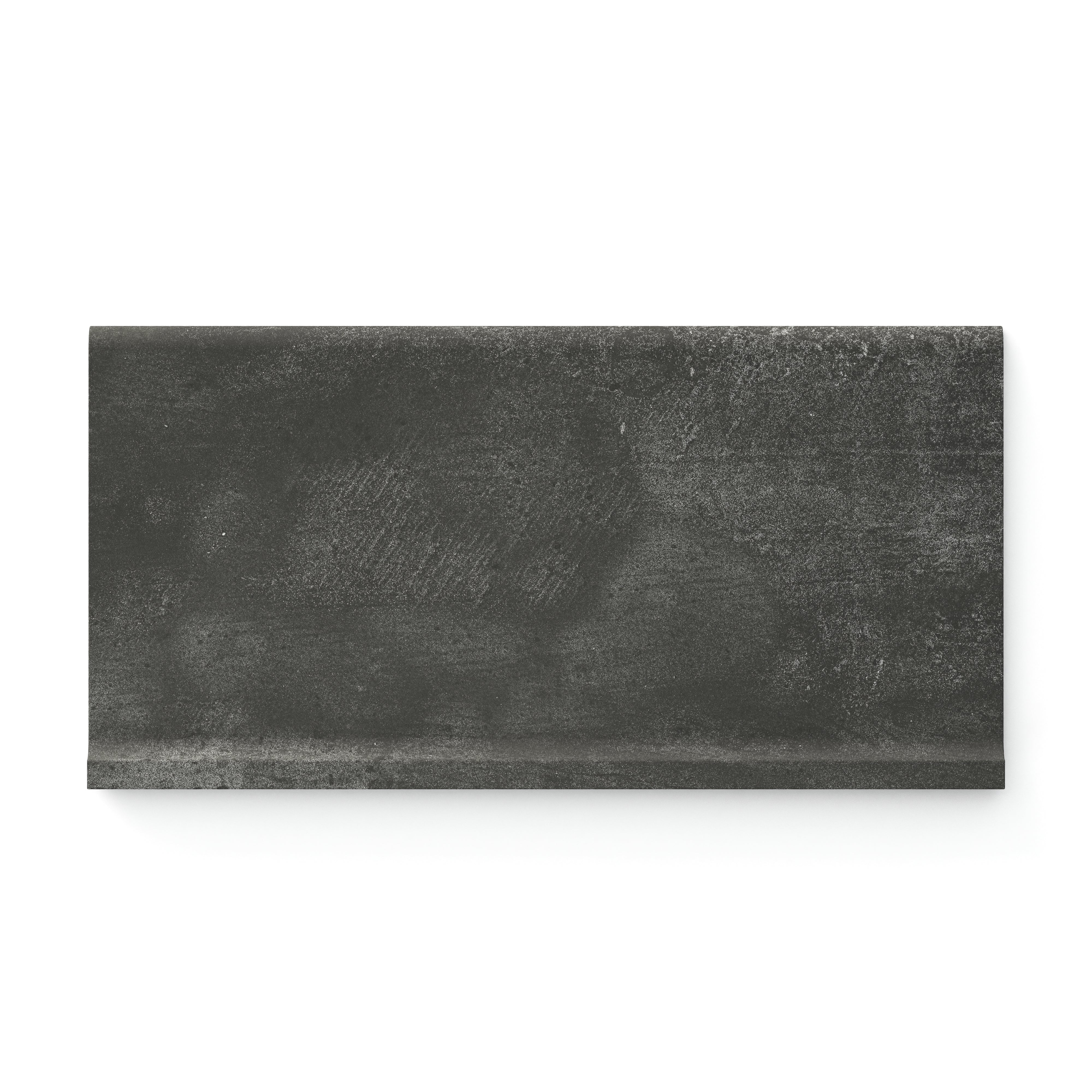 Ramsey 6x12 matte cove base tile, showcasing a rich dark gray tone with subtle concrete texture for modern elegance