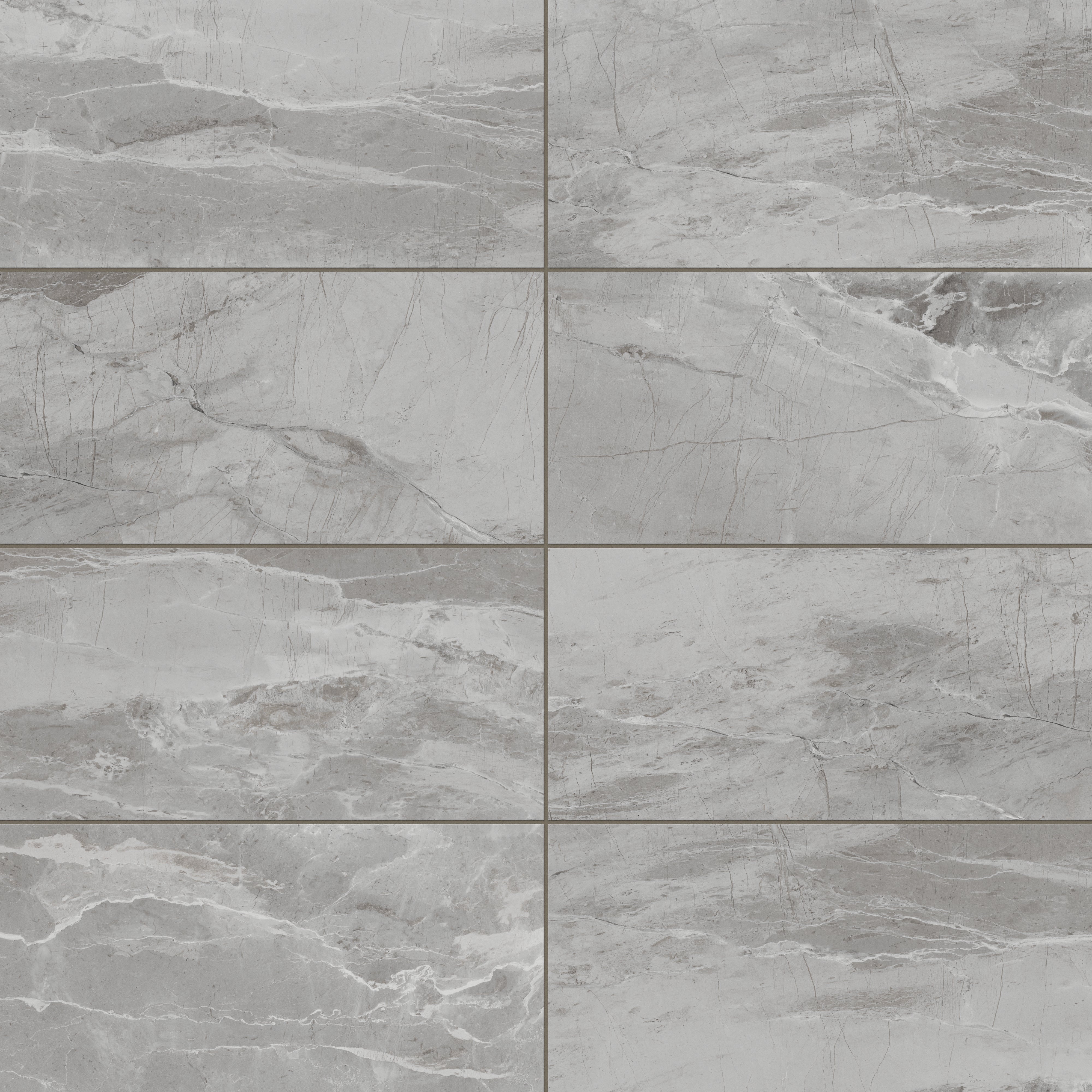 Soft grey matte tiles with subtle veining patterns, delivering a modern and versatile stone-like appearance.