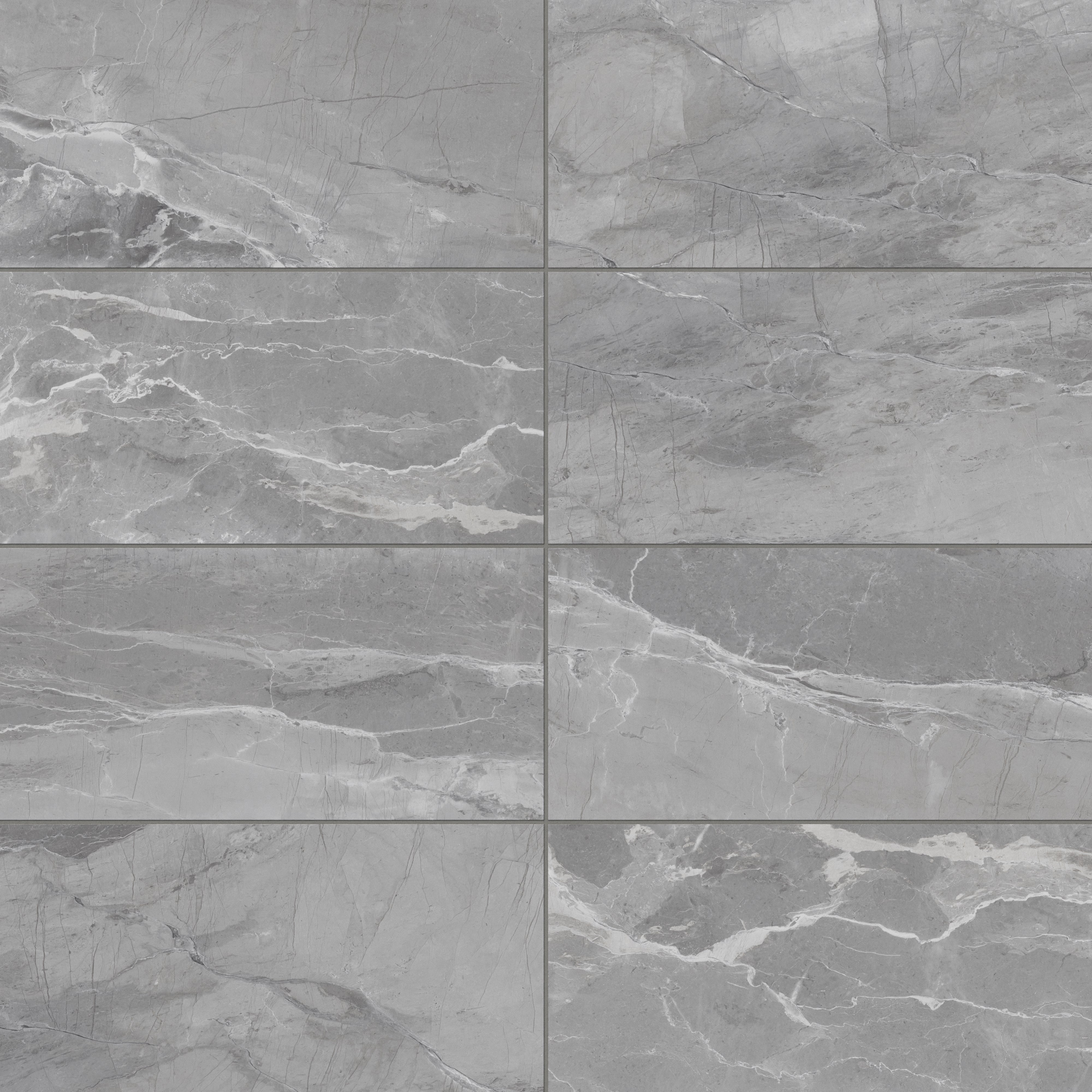 Cool grey matte tiles with fine white veining, offering a sleek and contemporary stone-inspired design.