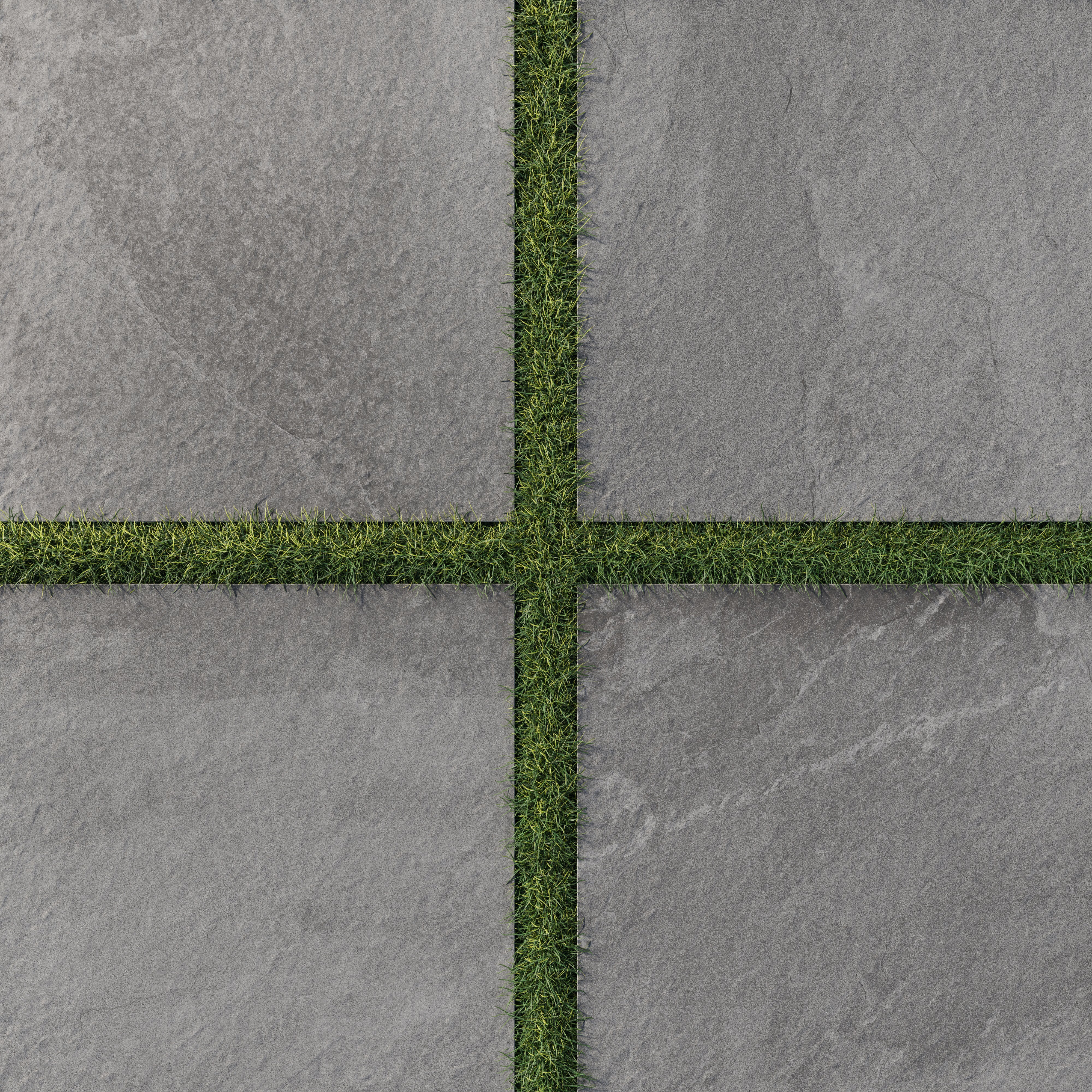 Bowden 24x24 Grip Porcelain 2CM Paver in Graphite, showcasing deep gray tones with lush grass accents for a refined outdoor aesthetic.