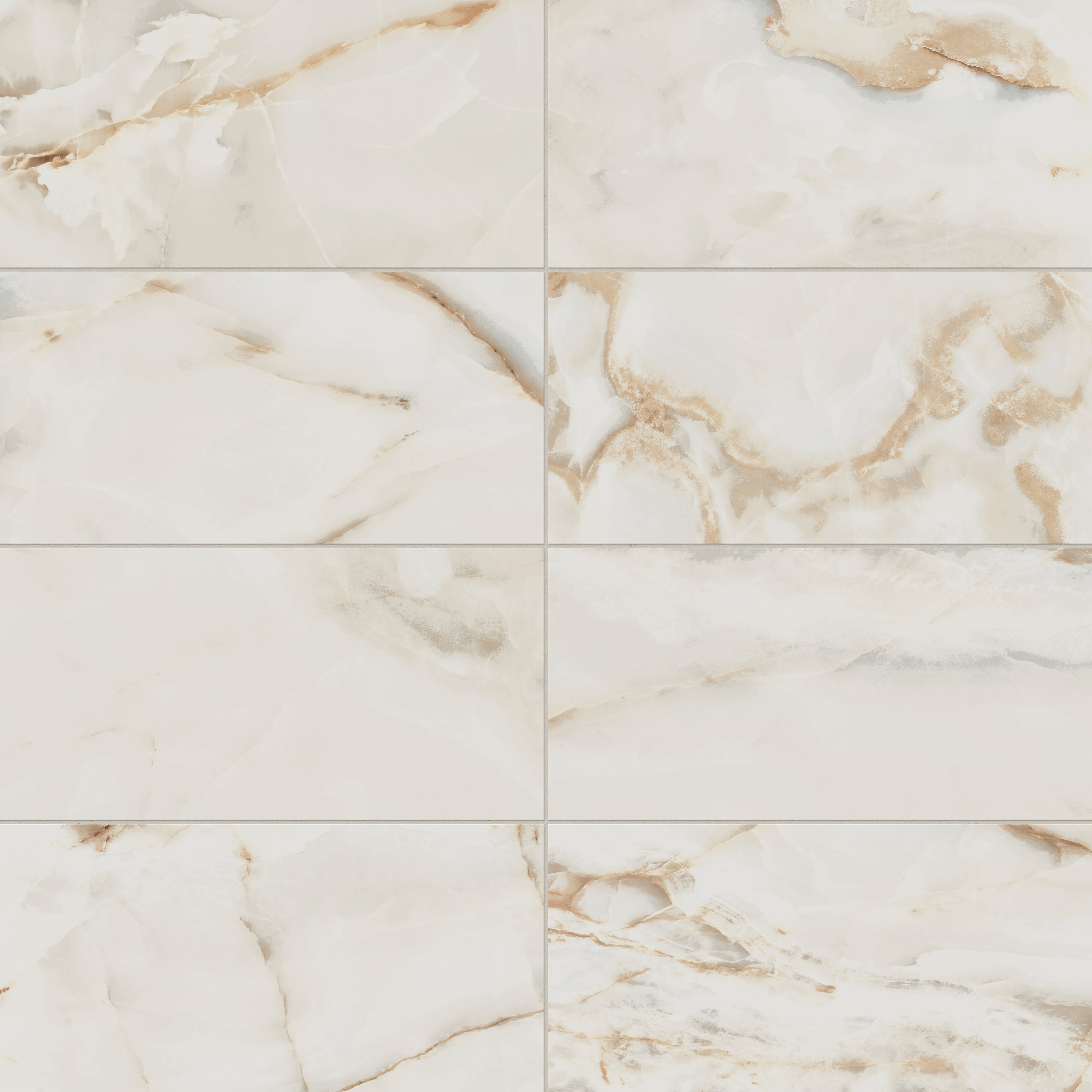 Astrid 12x24 matte porcelain tile in Alabaster, featuring a creamy white surface with intricate gold and beige veining for a sophisticated finish.