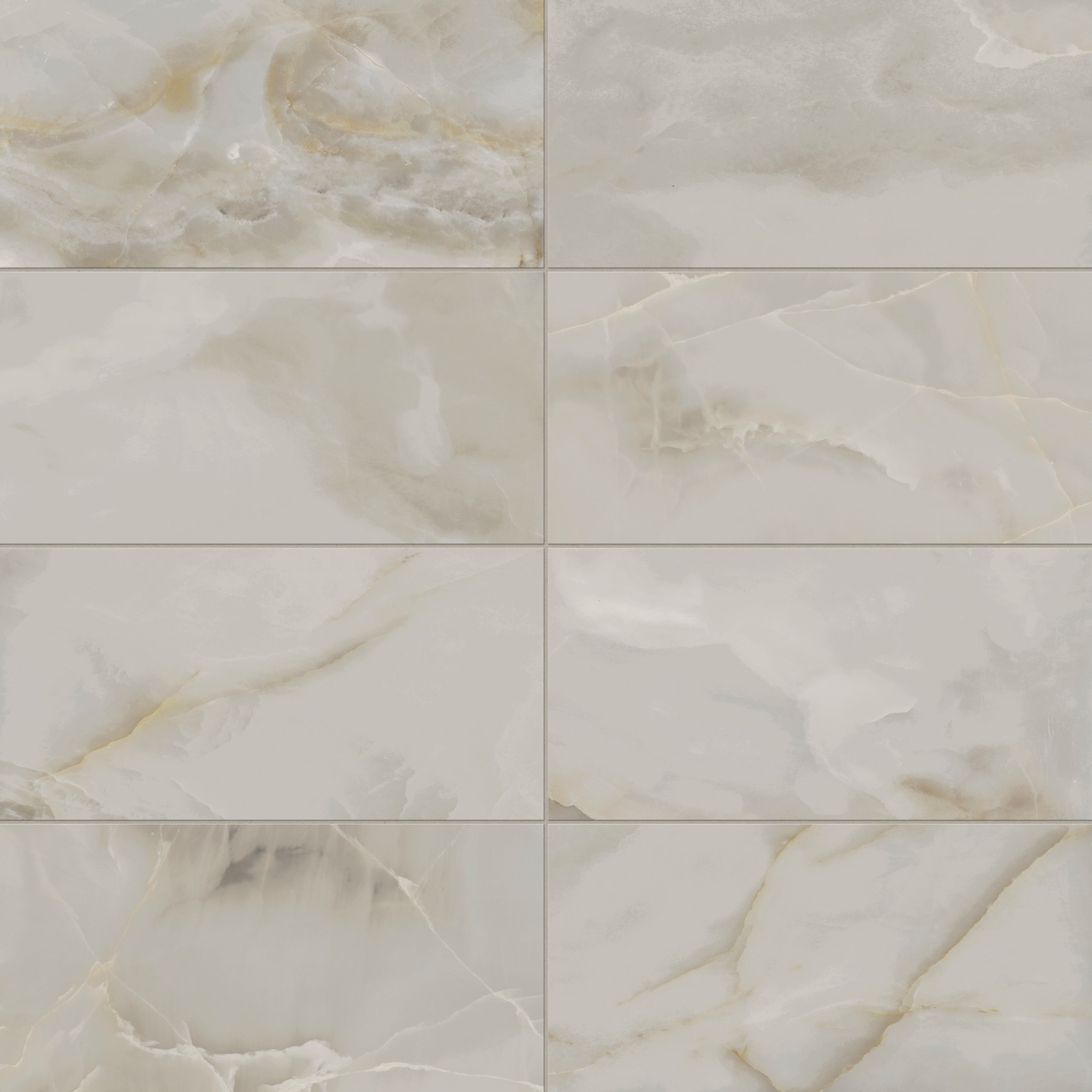 Astrid 12x24 matte porcelain tile in Oyster, featuring soft gray tones with delicate white and golden veining for a serene marble-like appearance.