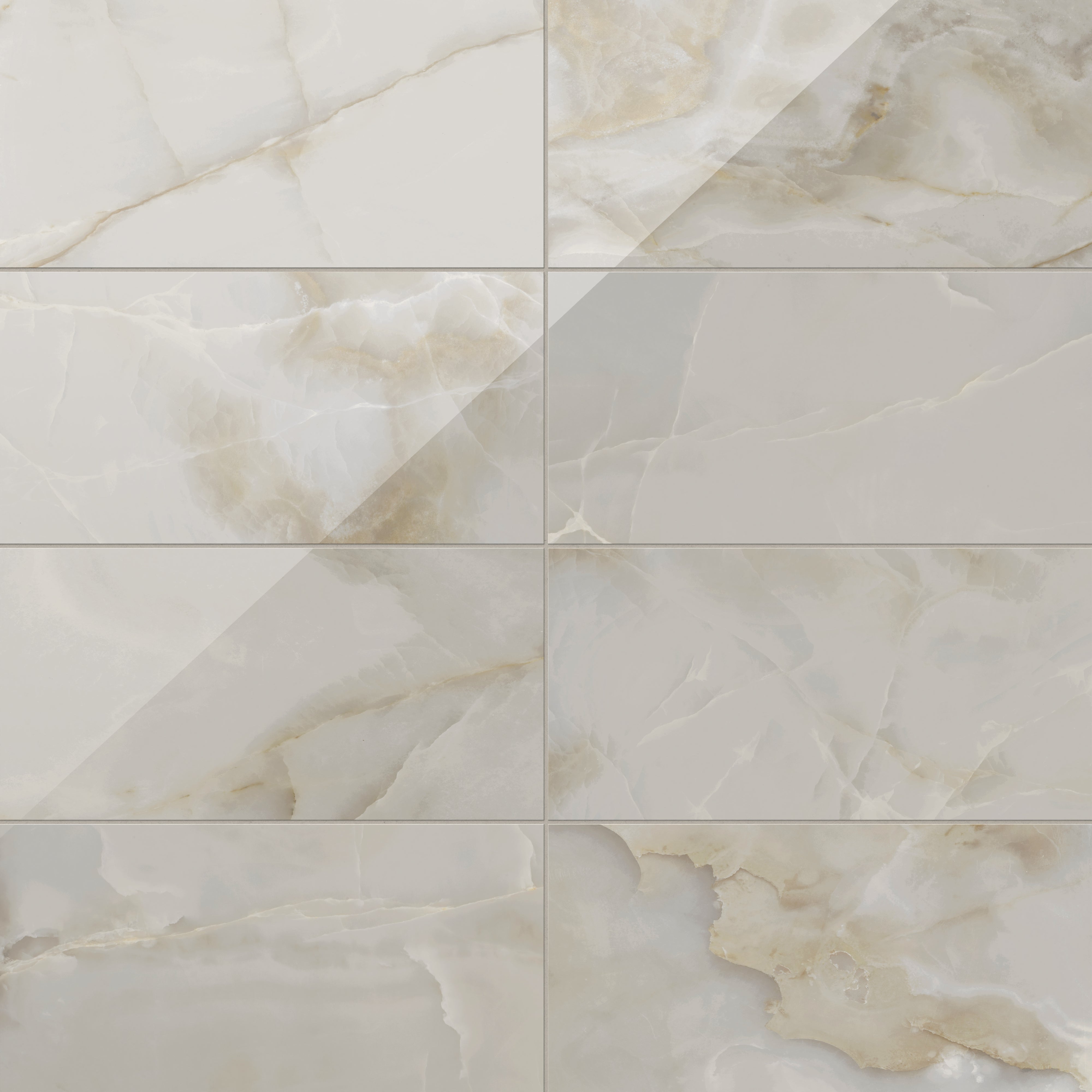 Astrid 12x24 polished porcelain tile in Oyster, featuring a glossy surface with subtle beige and cream veining for a refined look.