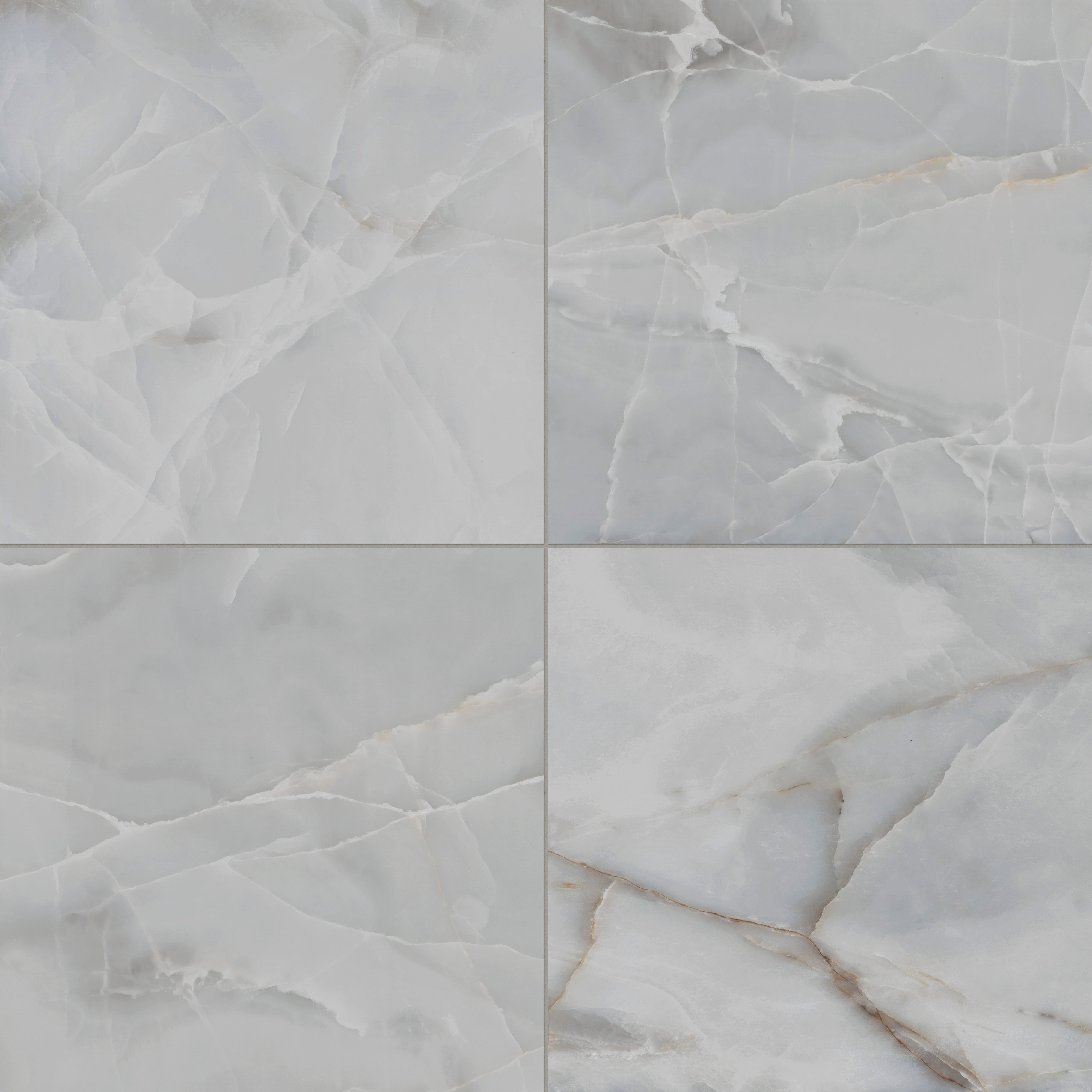 Astrid 24x24 matte porcelain tile in Slate, featuring a natural stone-like appearance with cool gray tones and subtle veining.