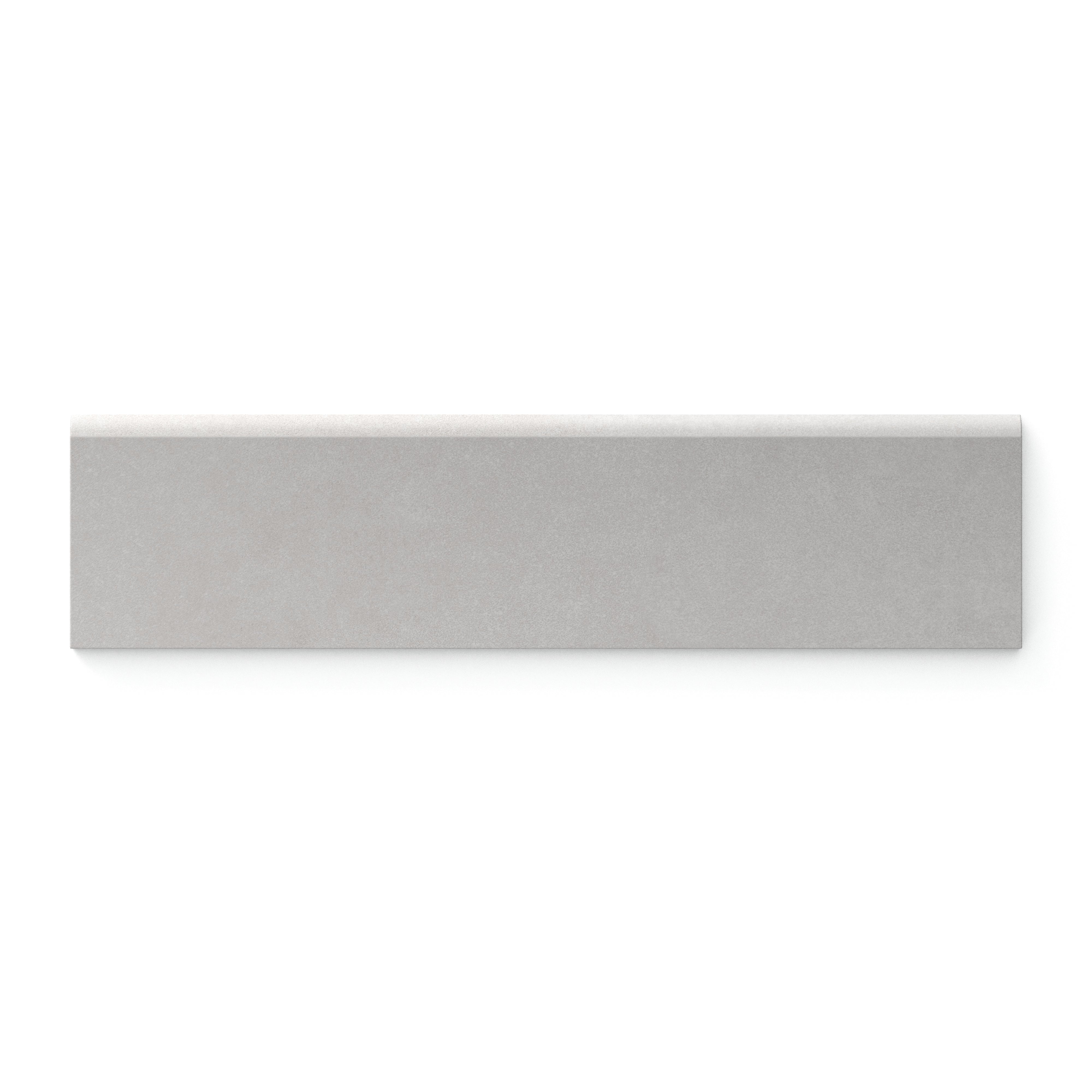 Soft gray Wyatt 3x12 matte porcelain bullnose tiles in Fog, ideal for creating clean edges and refined design finishes.