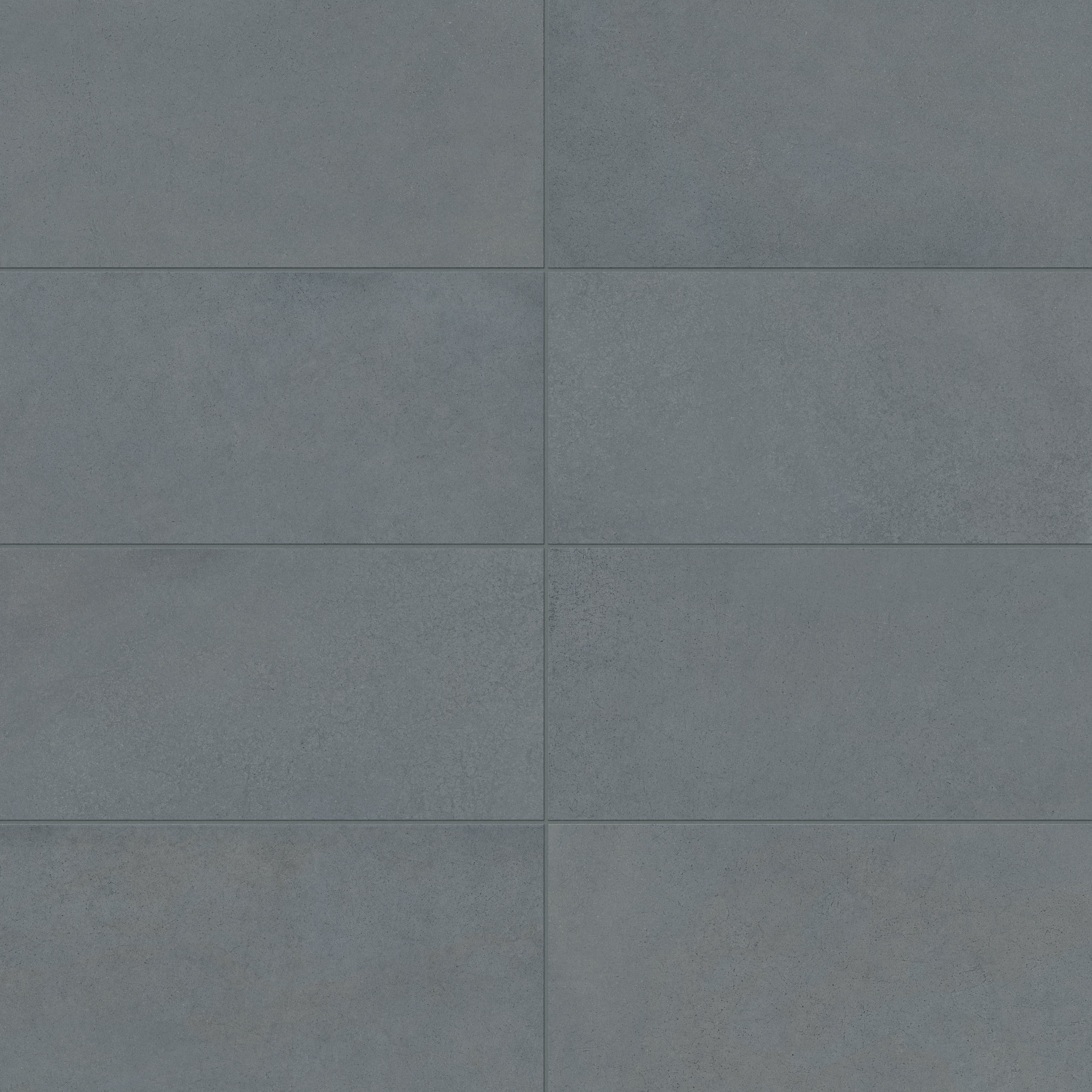 Palmer 12x24 matte porcelain tile in ocean blue showcasing a smooth finish and deep blue-gray tones.