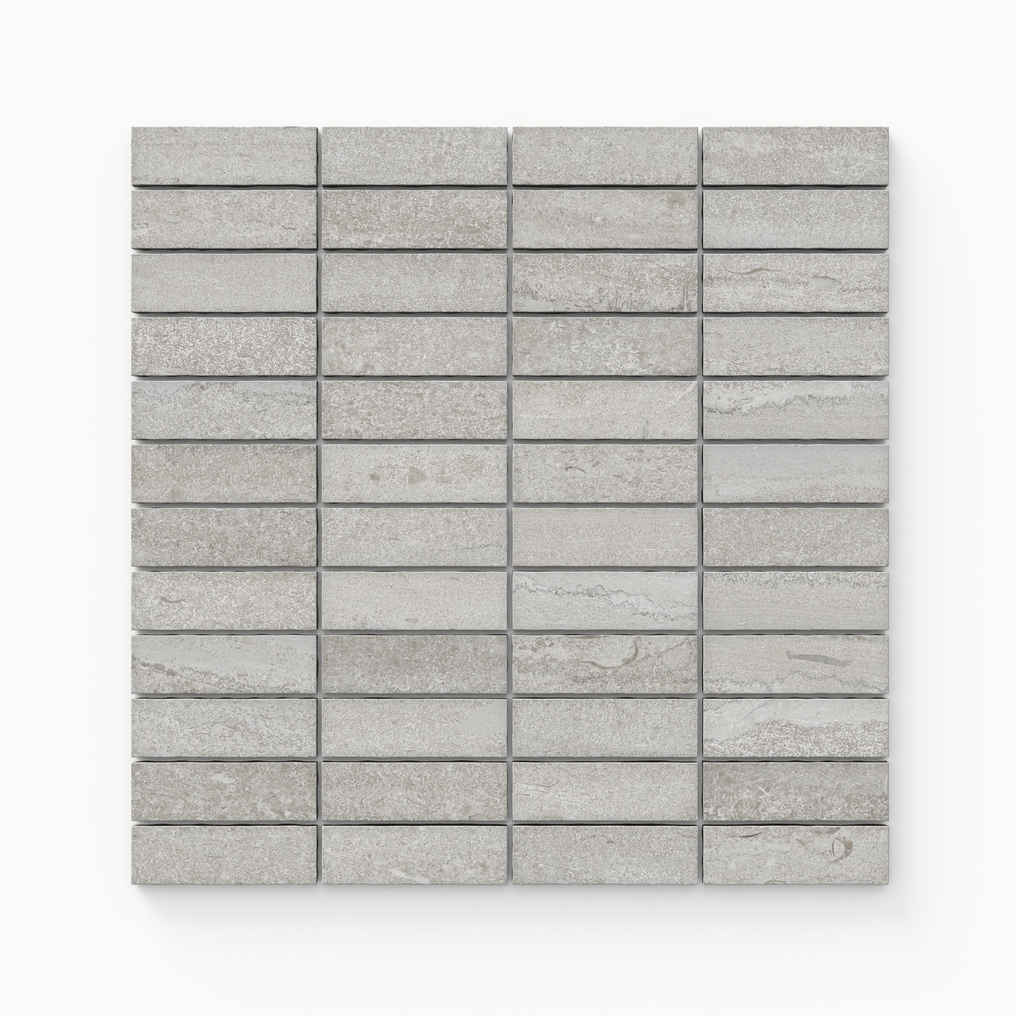 Matte porcelain mosaic tiles in a soft taupe tone, featuring a 1x3 vein-cut design that adds subtle texture and warmth to contemporary spaces.