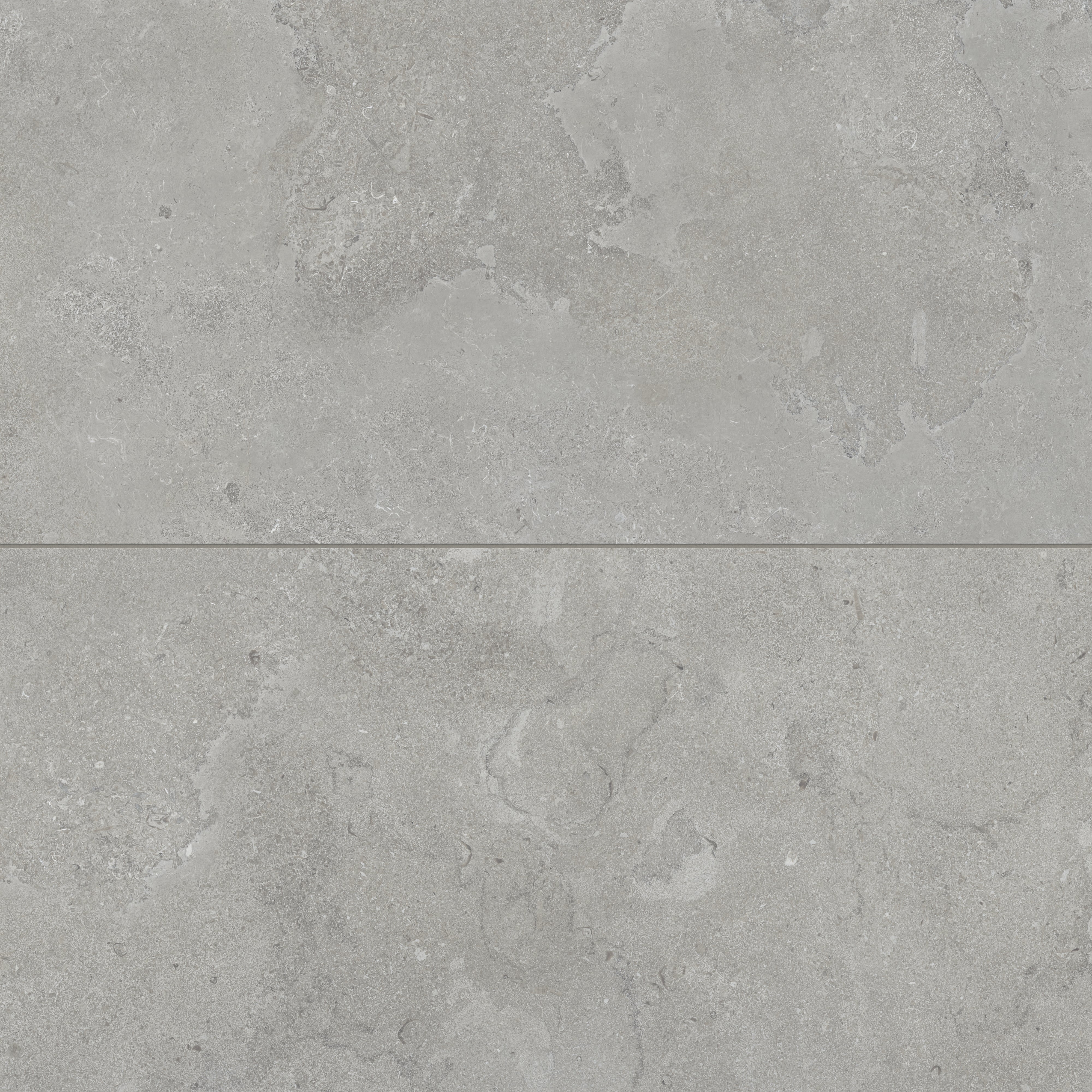 Large-format matte porcelain tiles in a soft ash grey tone, featuring intricate cross-cut patterns for a refined, natural stone appearance.