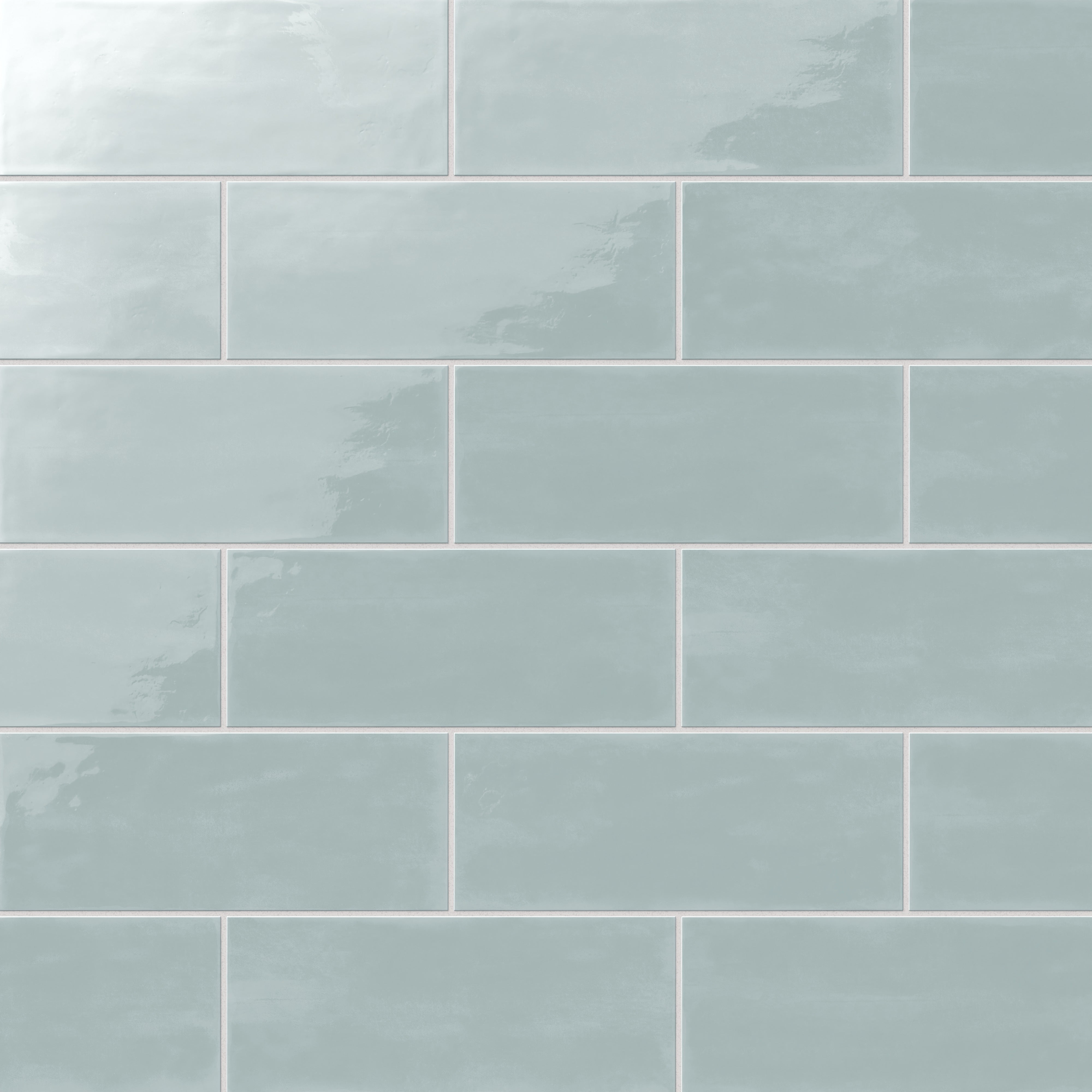Elegant sky blue 4x10-inch glossy ceramic tiles arranged in a classic subway layout, perfect for a refreshing and serene space