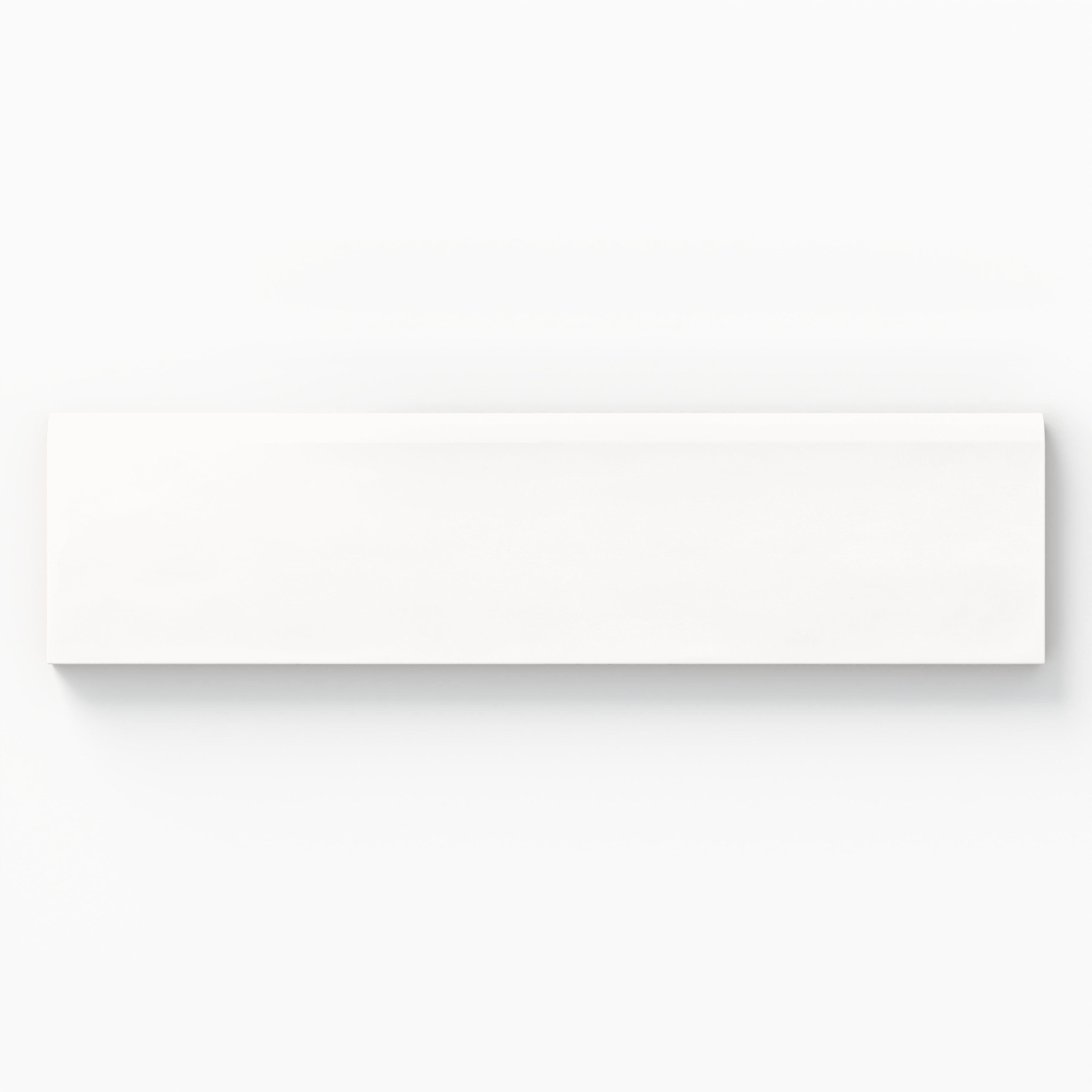 Glossy 3x10 bullnose tile in a clean white hue, ideal for seamless edges in modern or minimalist designs