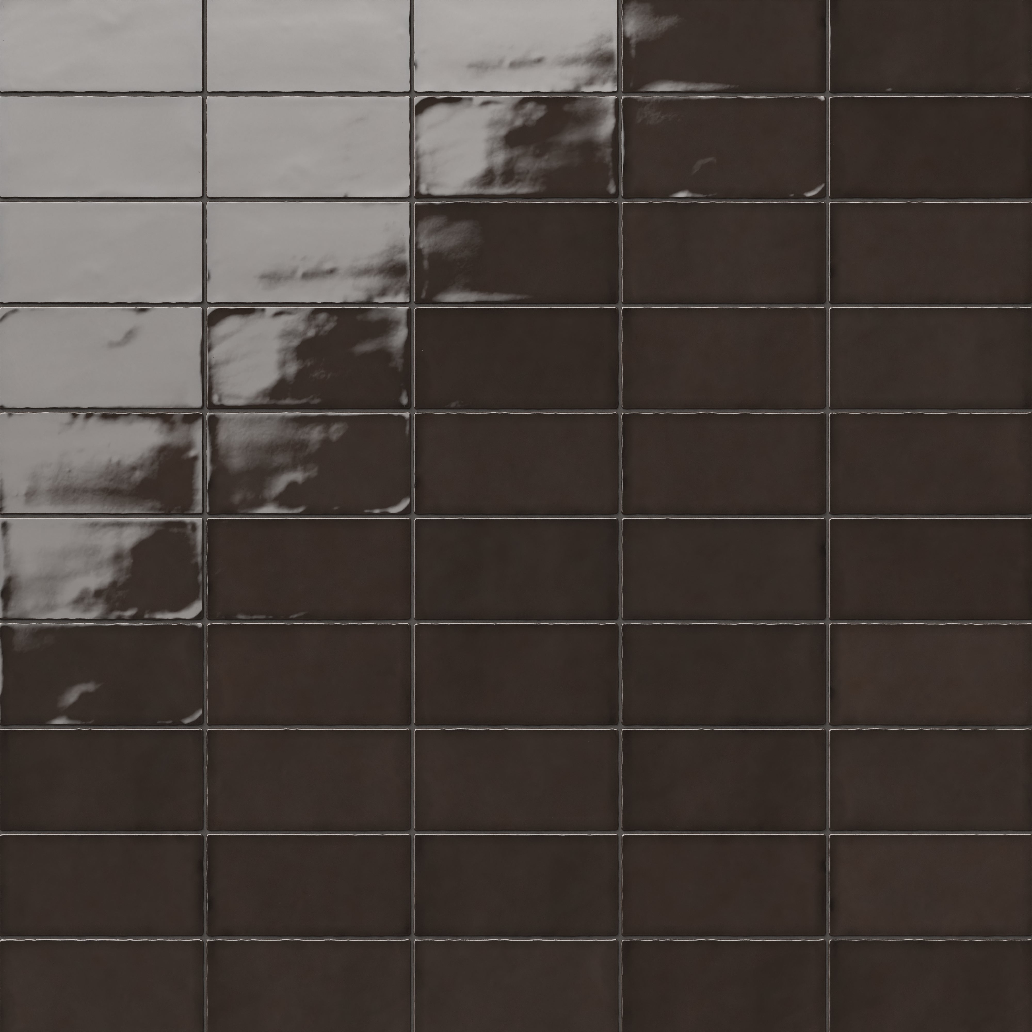 Mikayla dark brown ceramic subway tiles with a rich glossy finish, perfect for adding warmth and depth to any space