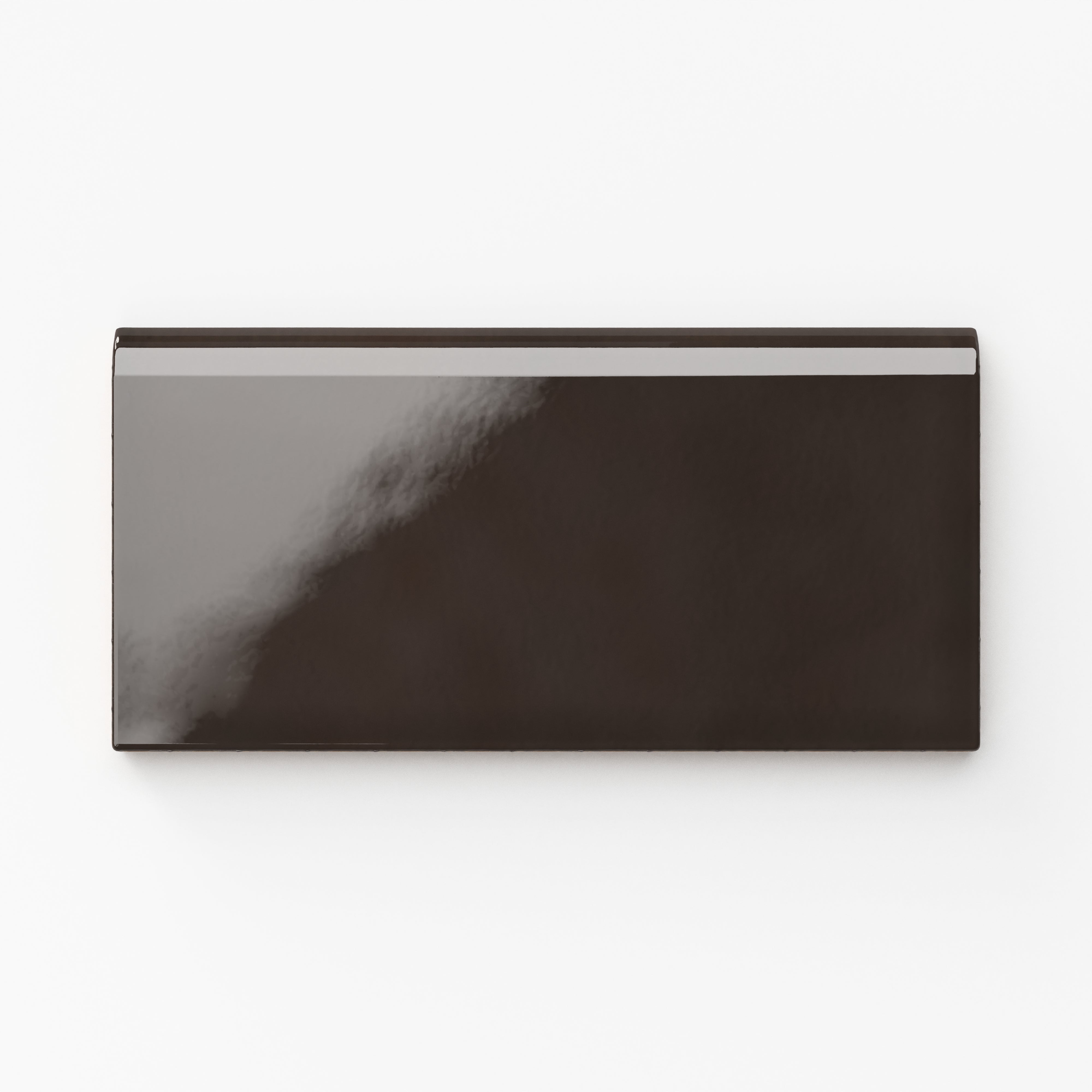 Glossy Mikayla ceramic bullnose tile in a rich dark brown hue, ideal for creating bold accents or elegant trim finishes