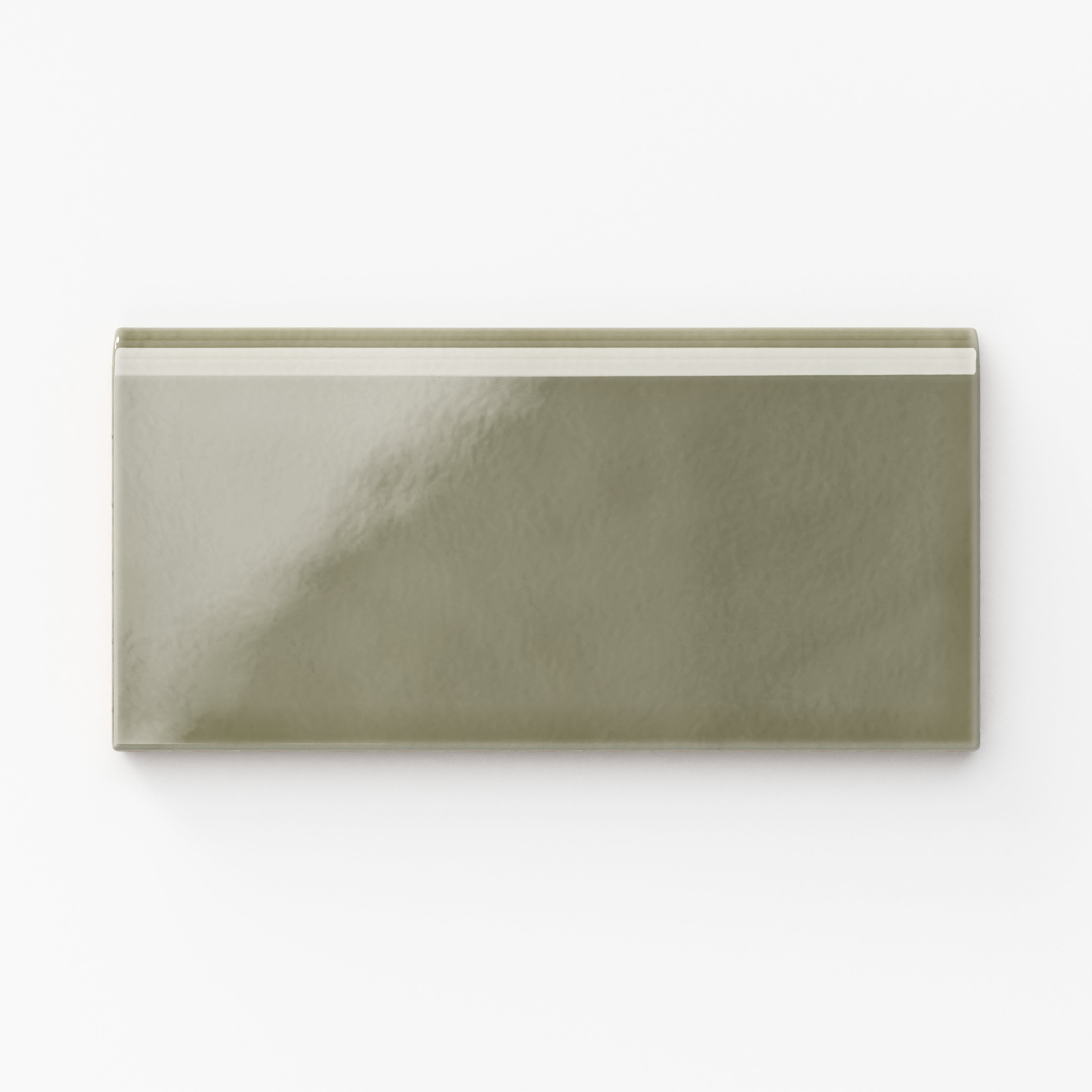Glossy Mikayla ceramic bullnose tile featuring an olive green tone, perfect for adding warmth and a natural touch to interiors