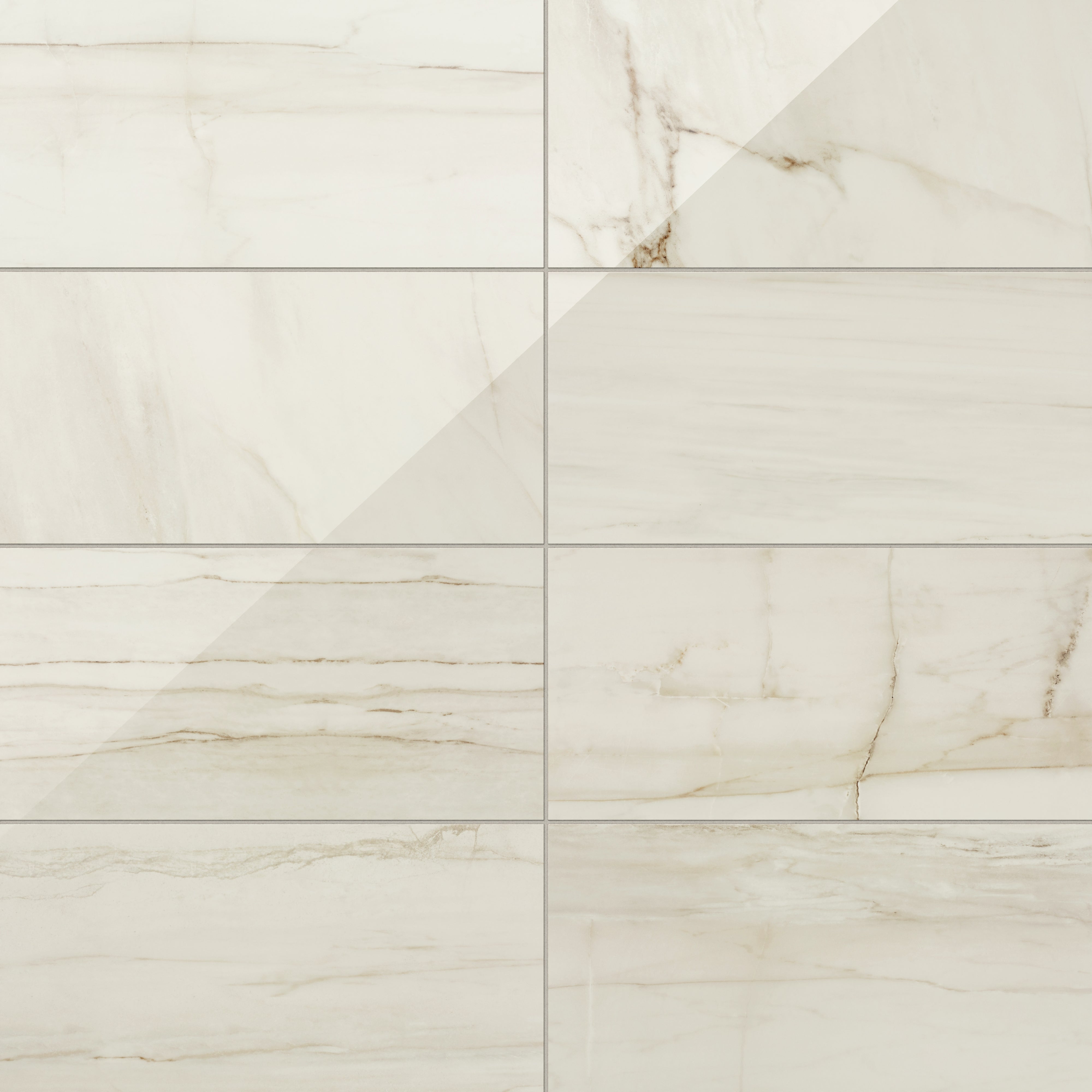 Kendrick Sand 12x24 tile in a polished finish, showcasing warm beige tones with delicate veining for a sleek and sophisticated appearance.