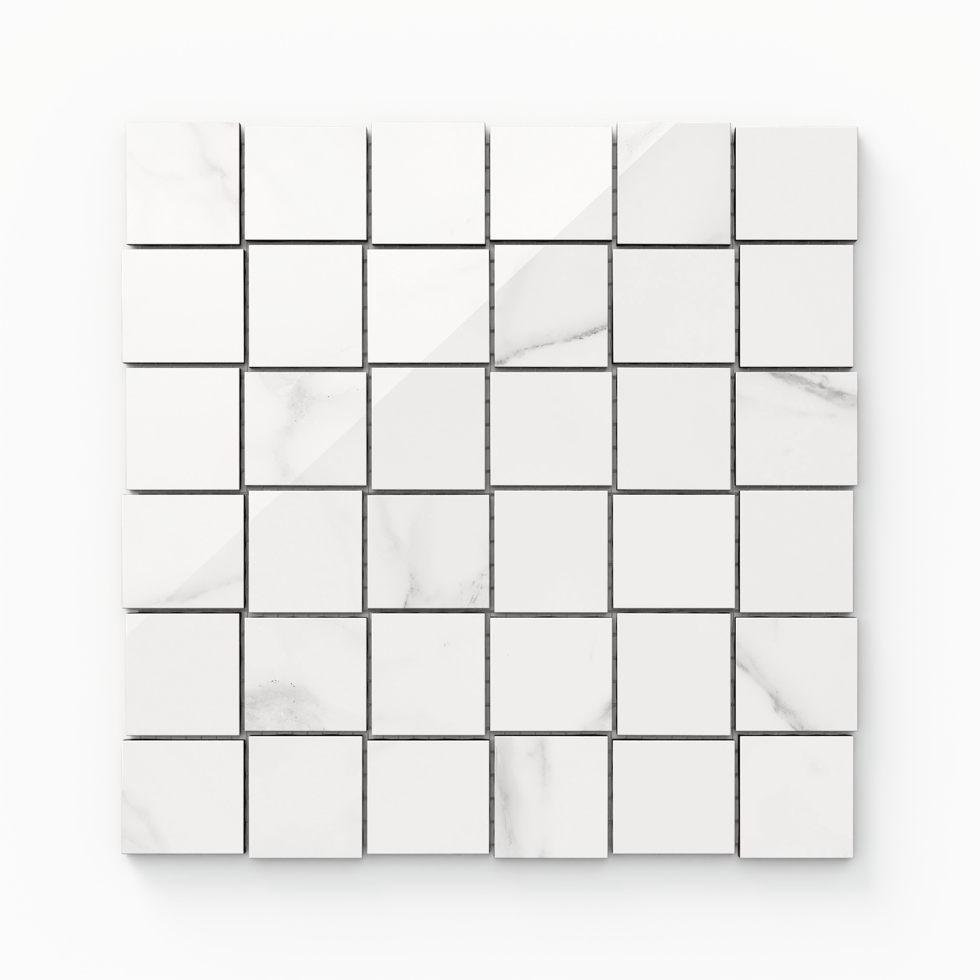 Julianna Carrara 2x2 polished mosaic tiles with soft gray veining, offering a classic marble aesthetic in a versatile format.