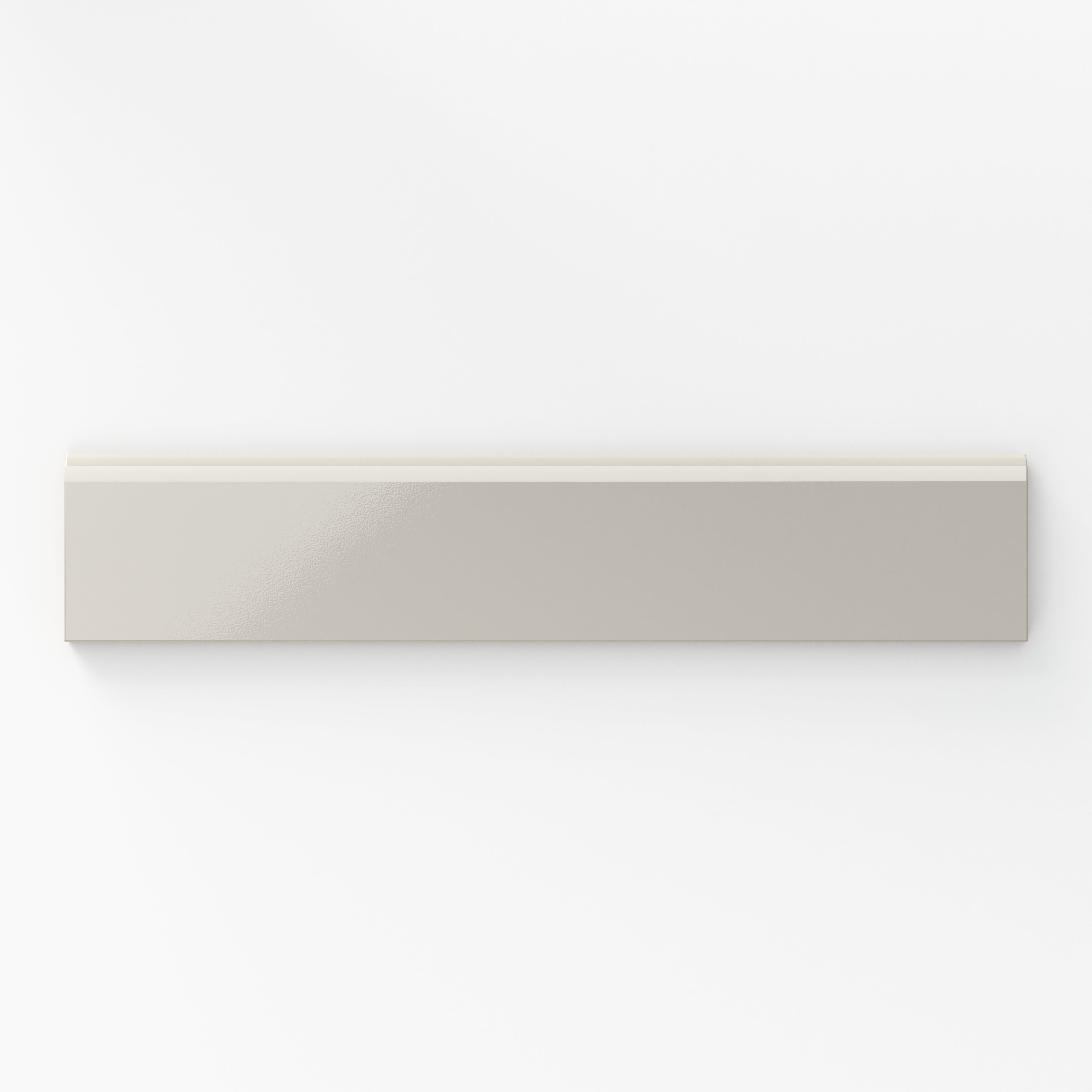 Soft, neutral-toned glossy beige 2x10 bullnose tiles are an elegant choice for creating sophisticated and seamless finishes.